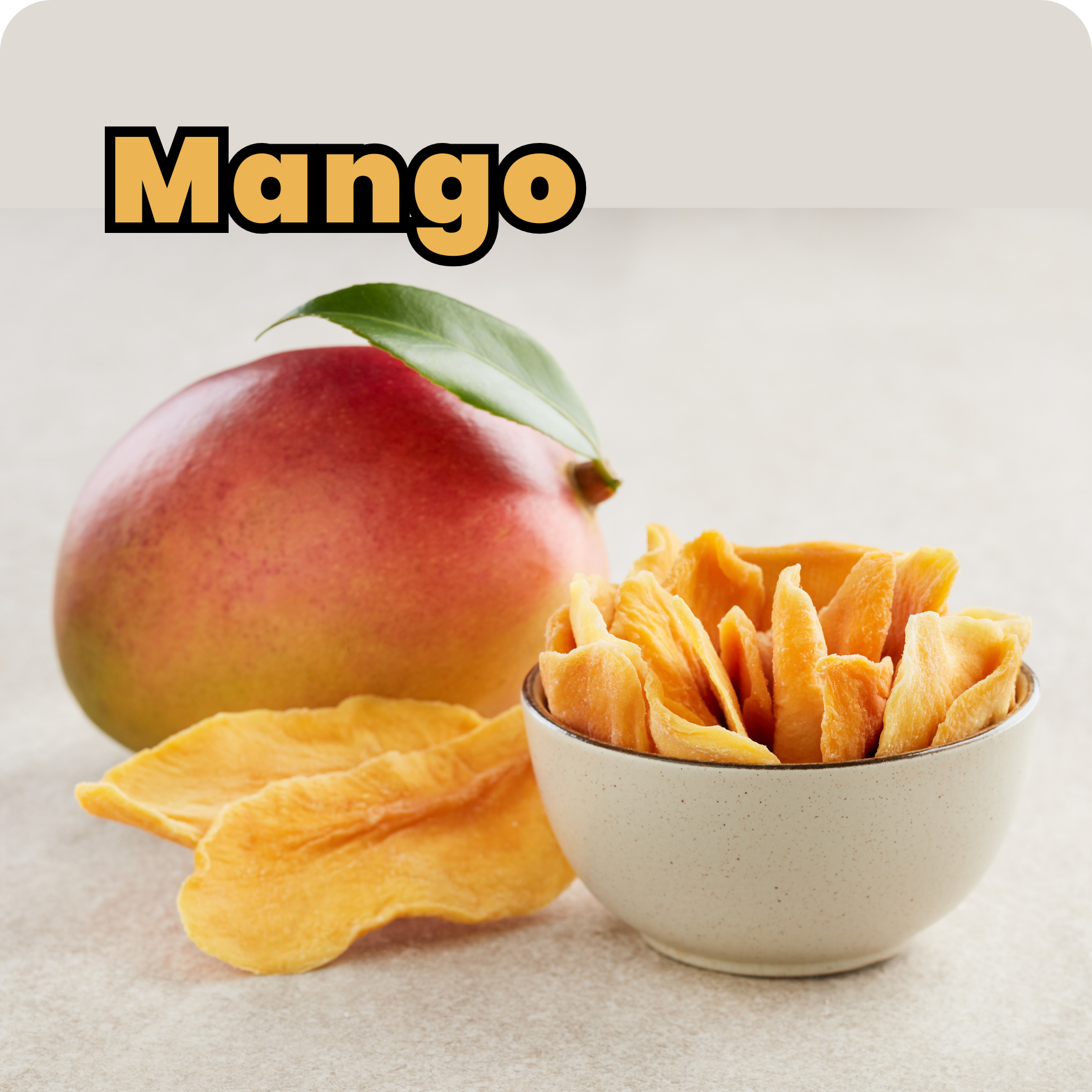 Fresh mango with one whole mango, slices in a bowl, and a mango leaf on top.