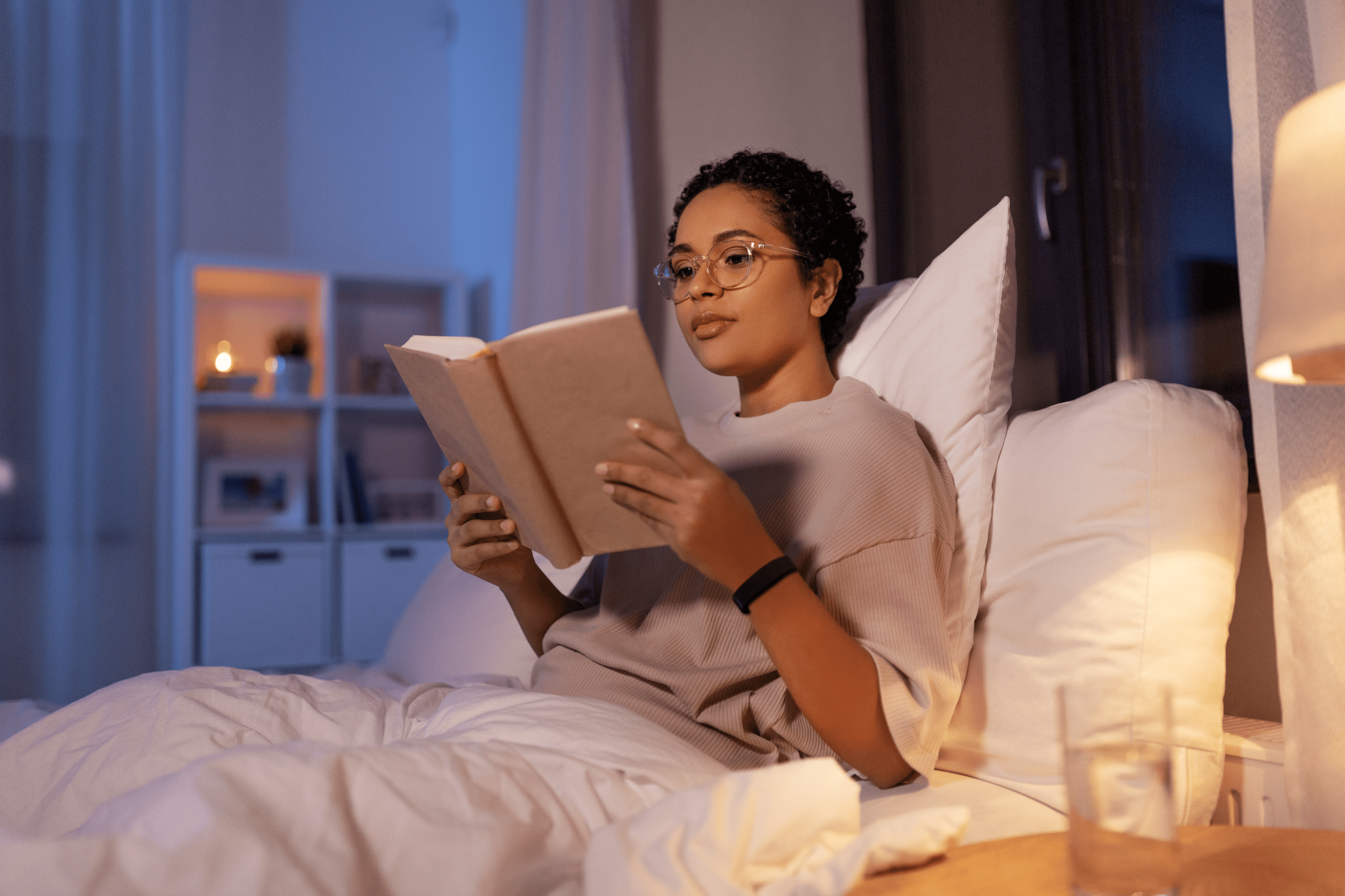 Woman reading book.png