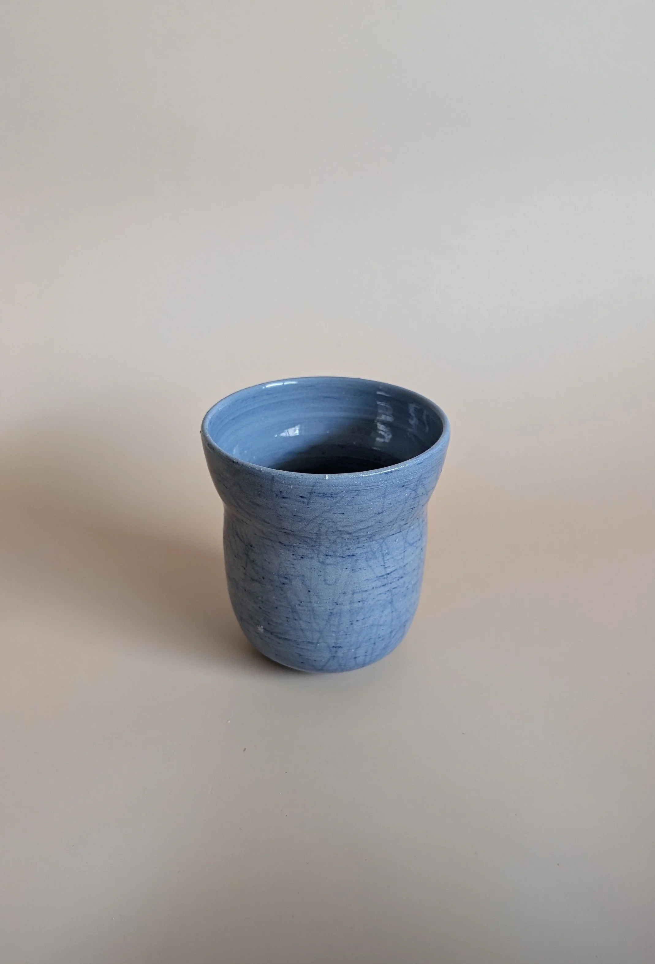 Muffin Top Cup in blue pencil on blue