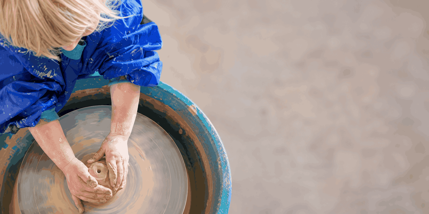Kid on the pottery wheel