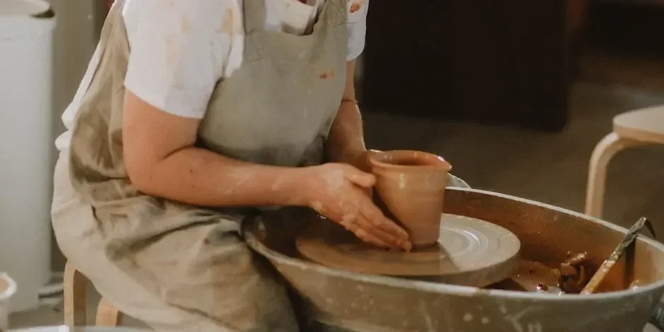 Wheel throwing pottery