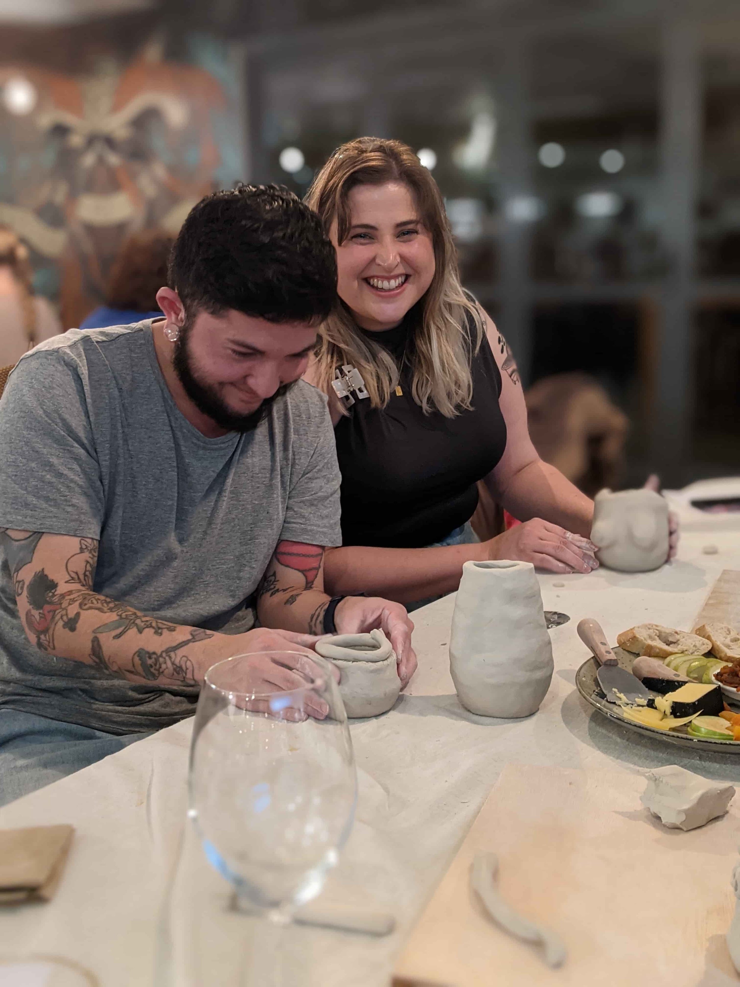 Couple enjoying a beginner pottery class at From Dust Studio in Perth