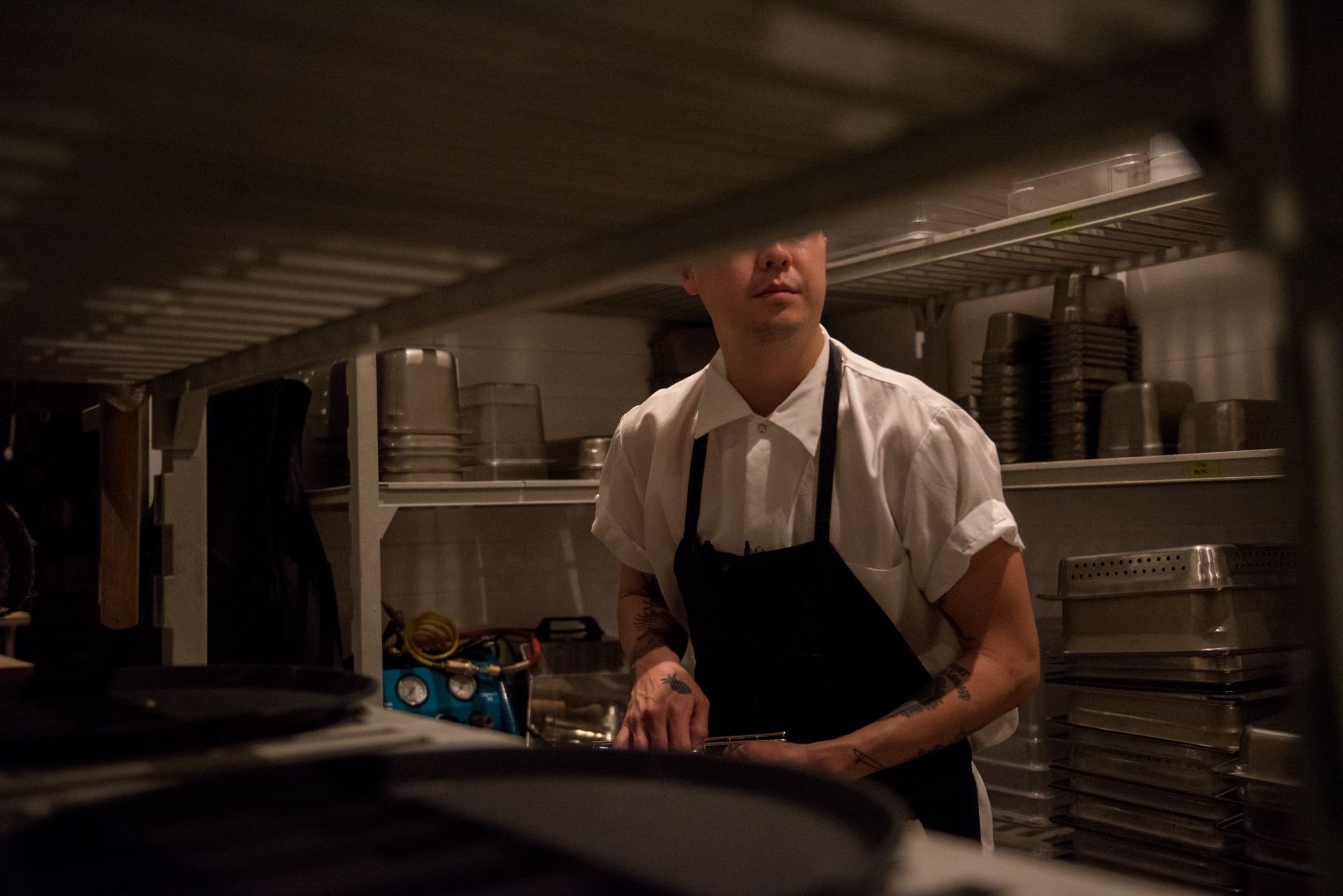  Eric Ehler works late in the kitchen at Mister Jiu’s on Wednesday, March 21, 2018. | Rosa Furneaux, Special To The Chronicle 