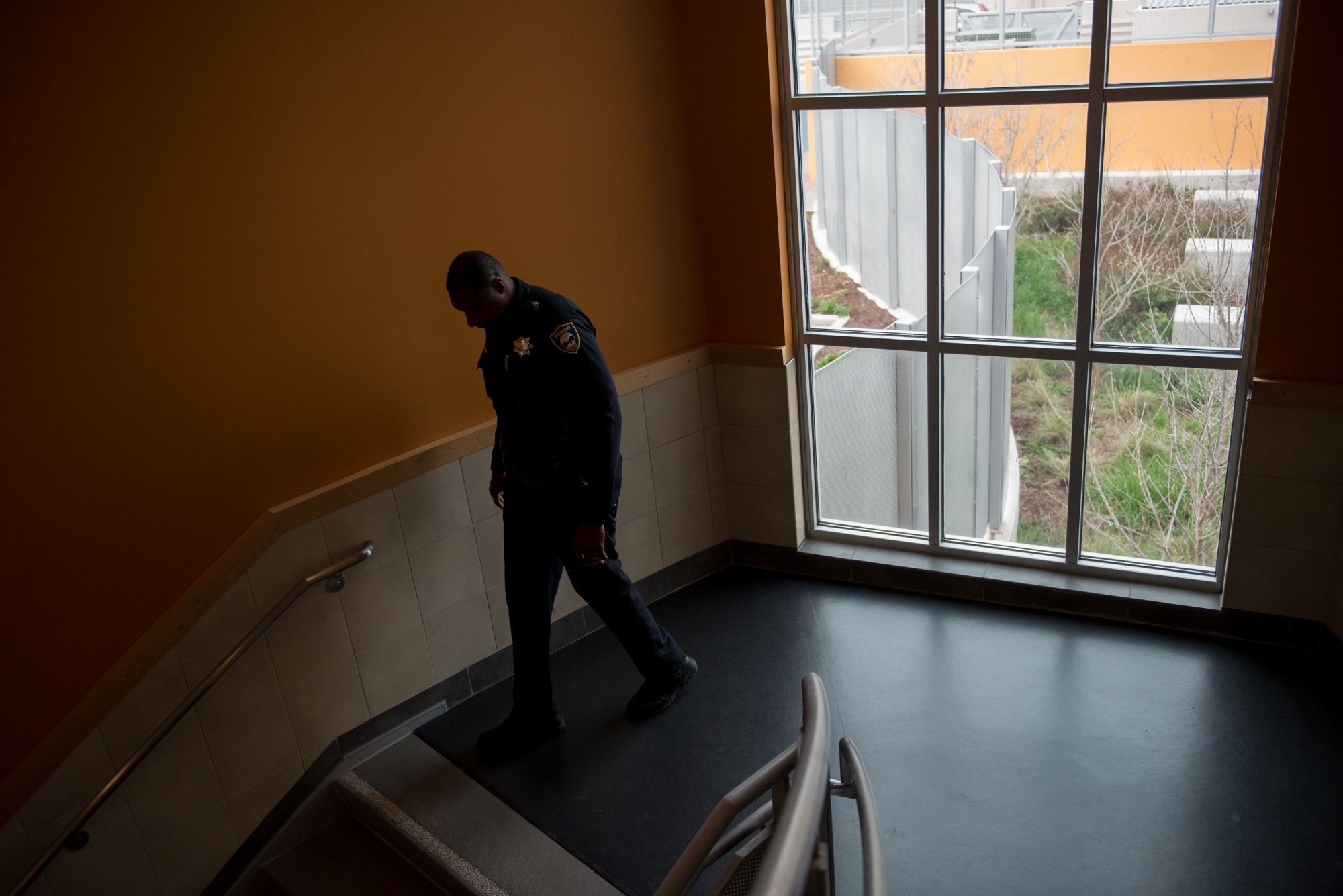  Officer Gary Lewis patrols the hallways at Sylvester Greenwood Academy on Friday, March 9 2018. | Rosa Furneaux, Special To The Chronicle 