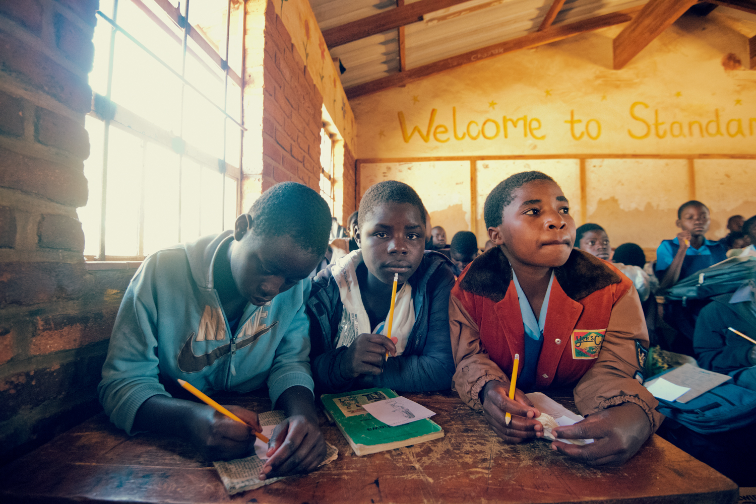  Students at Dedza Government Primary draw pictures to send back to pupils at their link-school, Corpusty Primary in North Norfolk, on Tuesday, April 19, 2016. | Rosa Furneaux for the Eastern Daily Press 