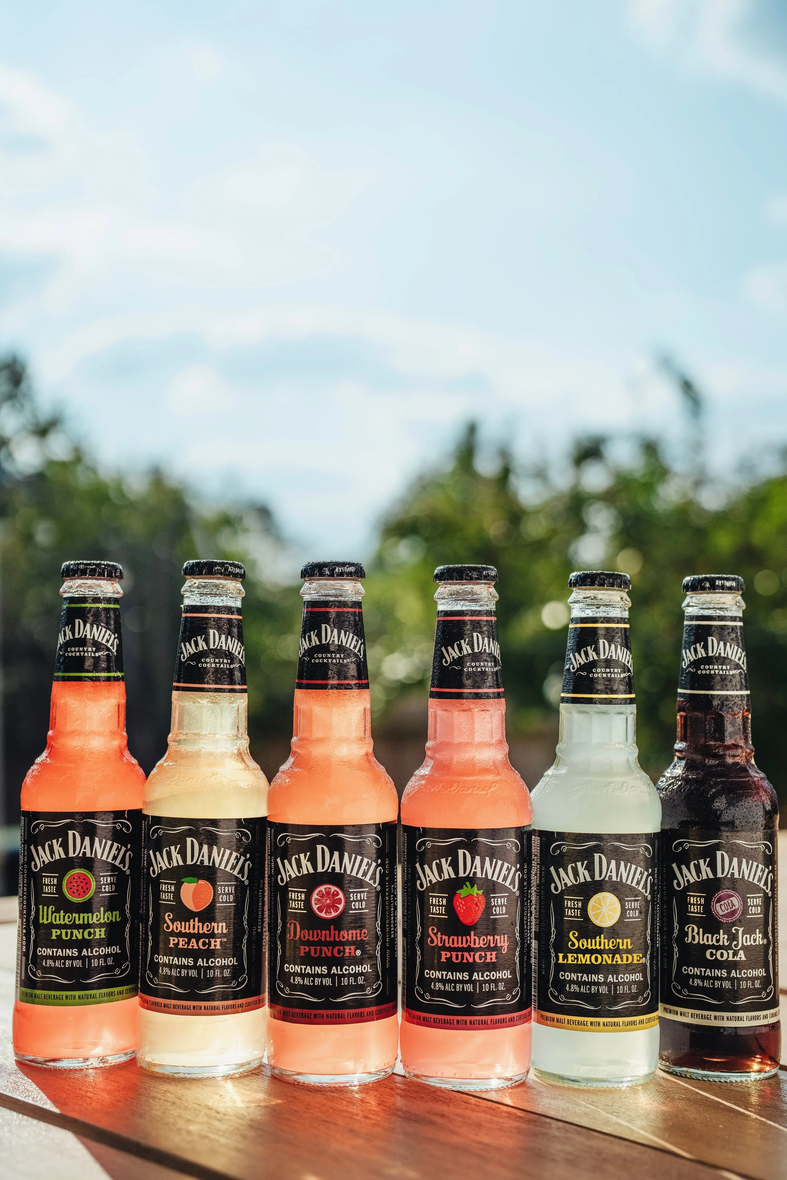 Commercial beverage and food product photography for Jack Daniels featuring bold, vibrant styling and natural outdoor lighting, creating a high-impact, eye-catching visual for alcohol brands, social media, and advertising content in Austin, Texas.