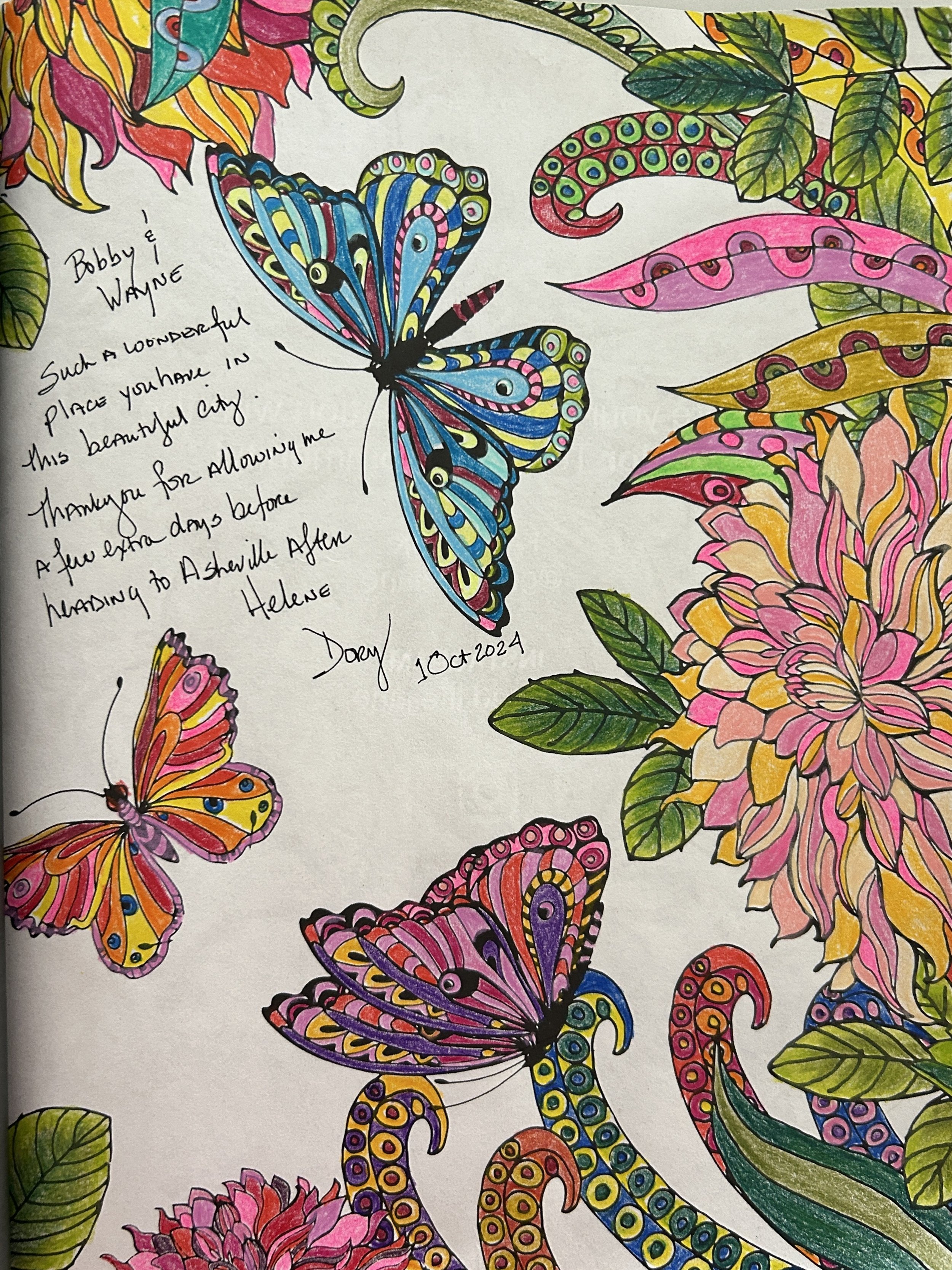 Colorful hand-drawn illustration of butterflies and flowers with a handwritten note.
