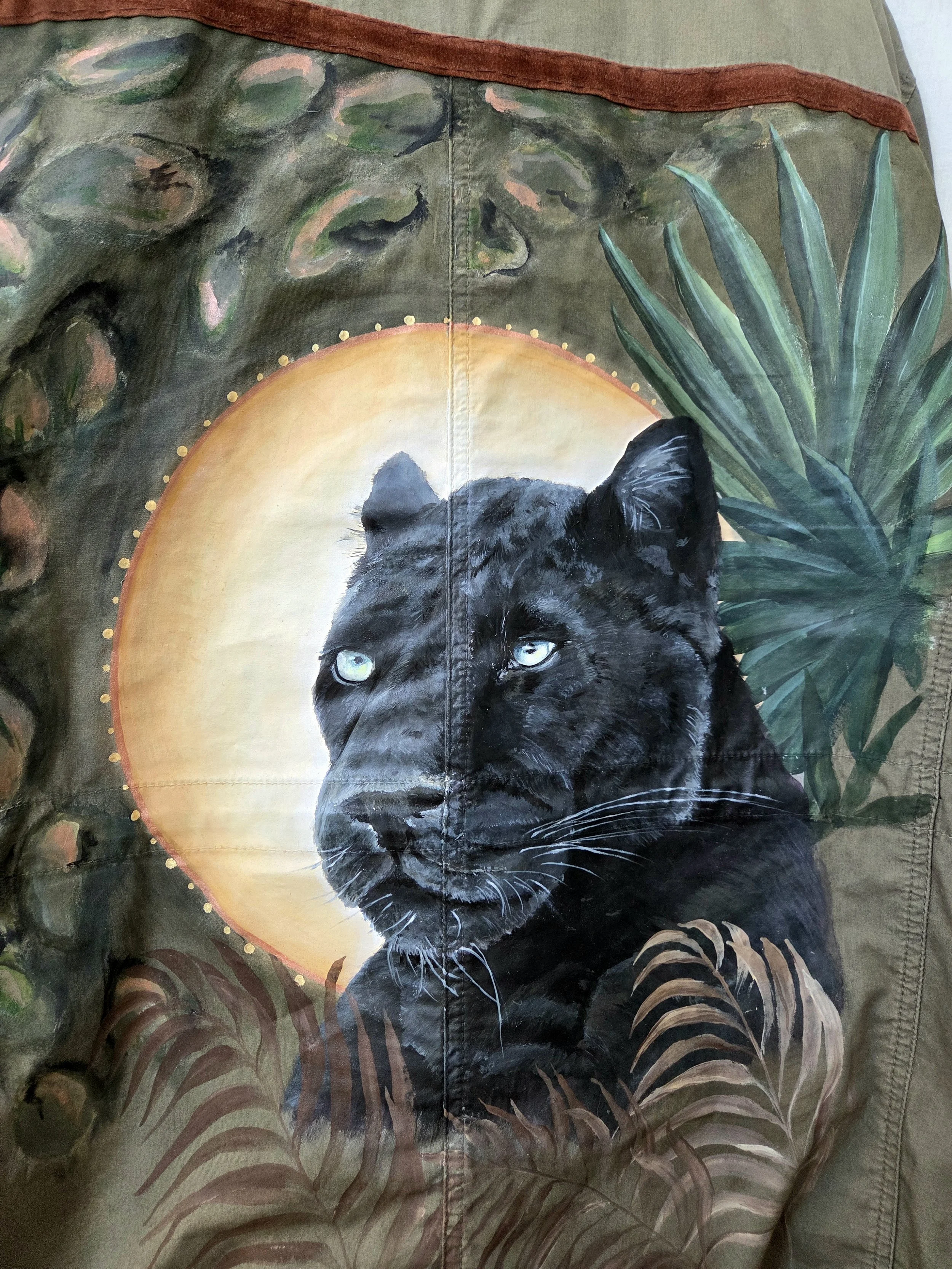 Black Puma painted artwork on jacket.jpg