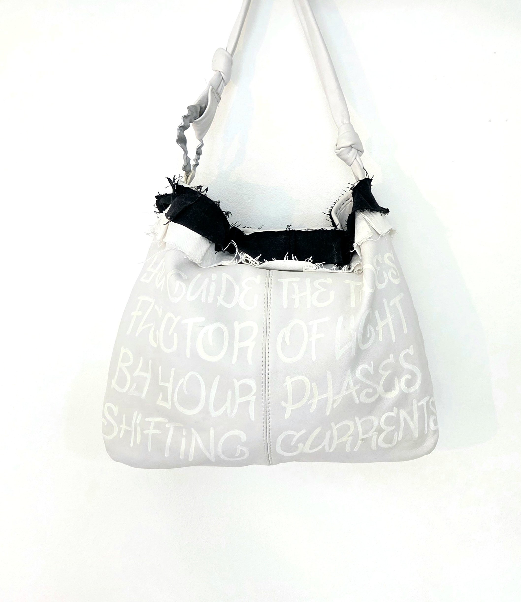 Reworked leather bag.jpeg