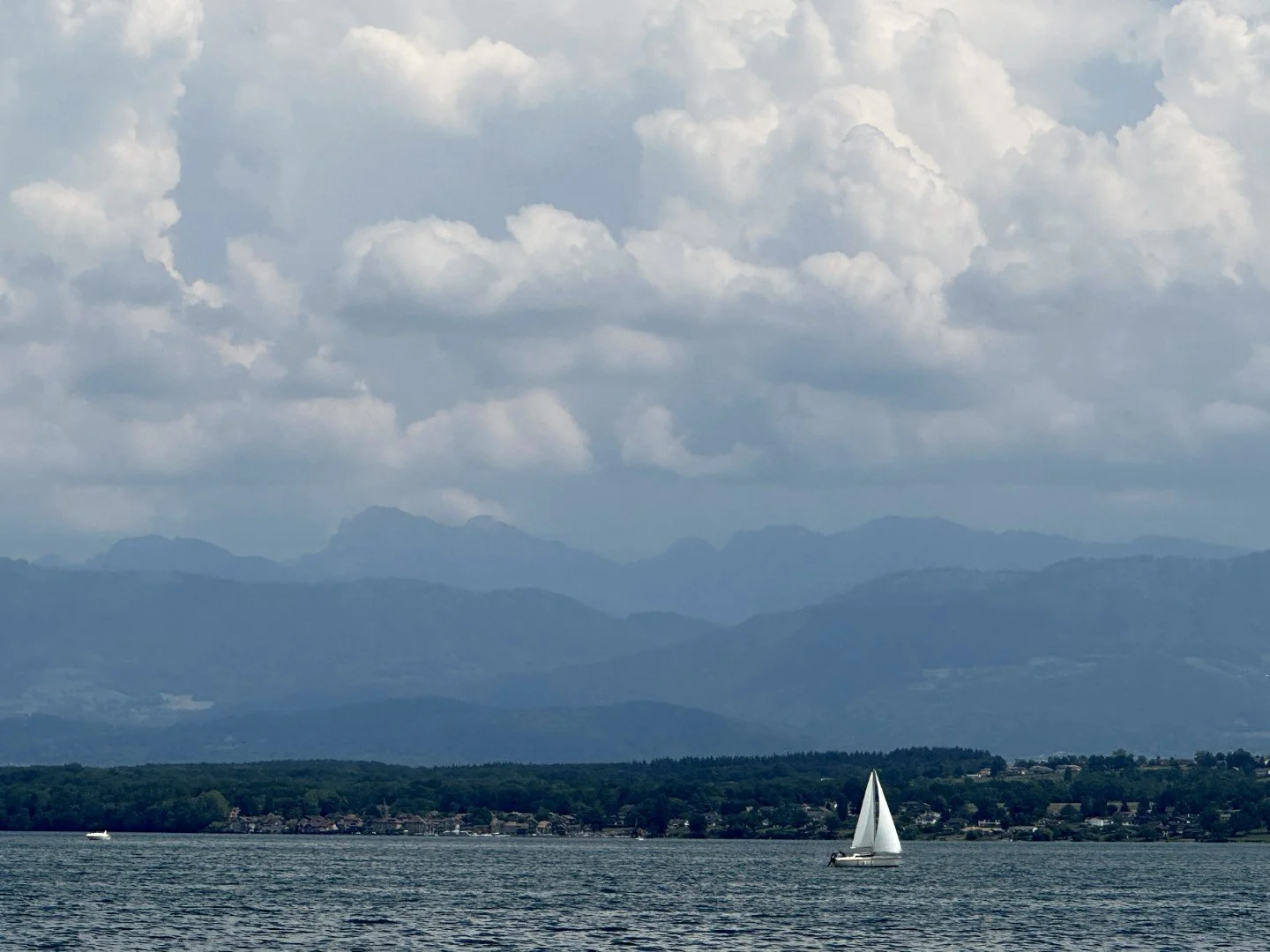 Lake Geneva looking across at the French mountains.