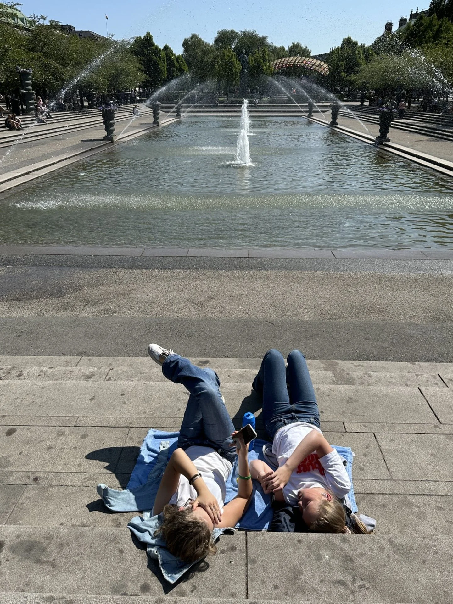 Sunning in Kungstragarden. After a long dark winter the Swedes love their long sunny summer days