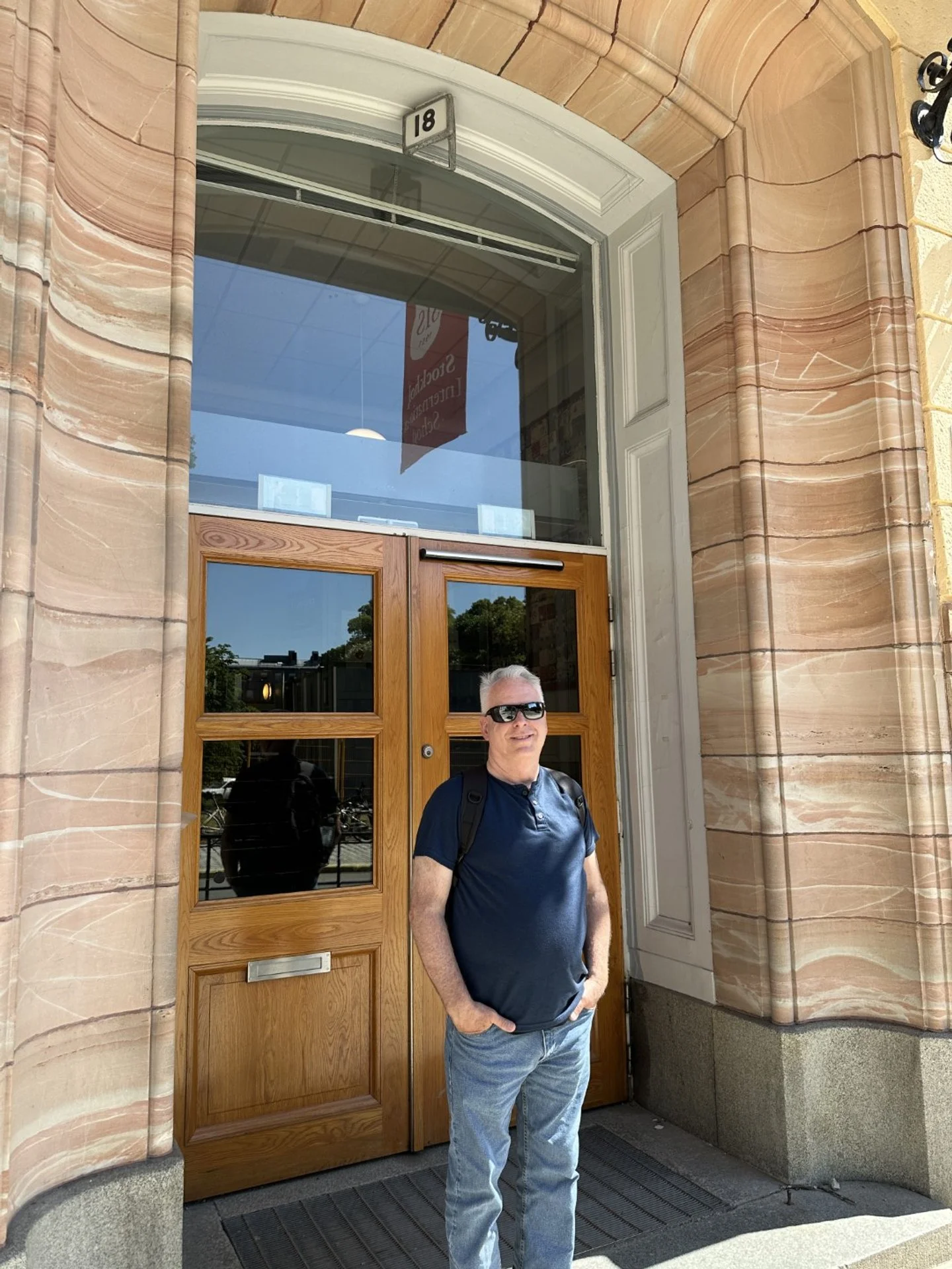 Standing at the doorway of my old grade school, Anglo-American School, now known as the Stockholm International School. On our visit we learned that the school would be moving to another location in the fall of 2023 so we just made it. This building 