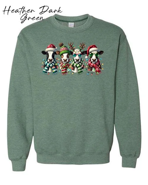 4 Xmas cows on Heather dark green sweatshirt.jpg