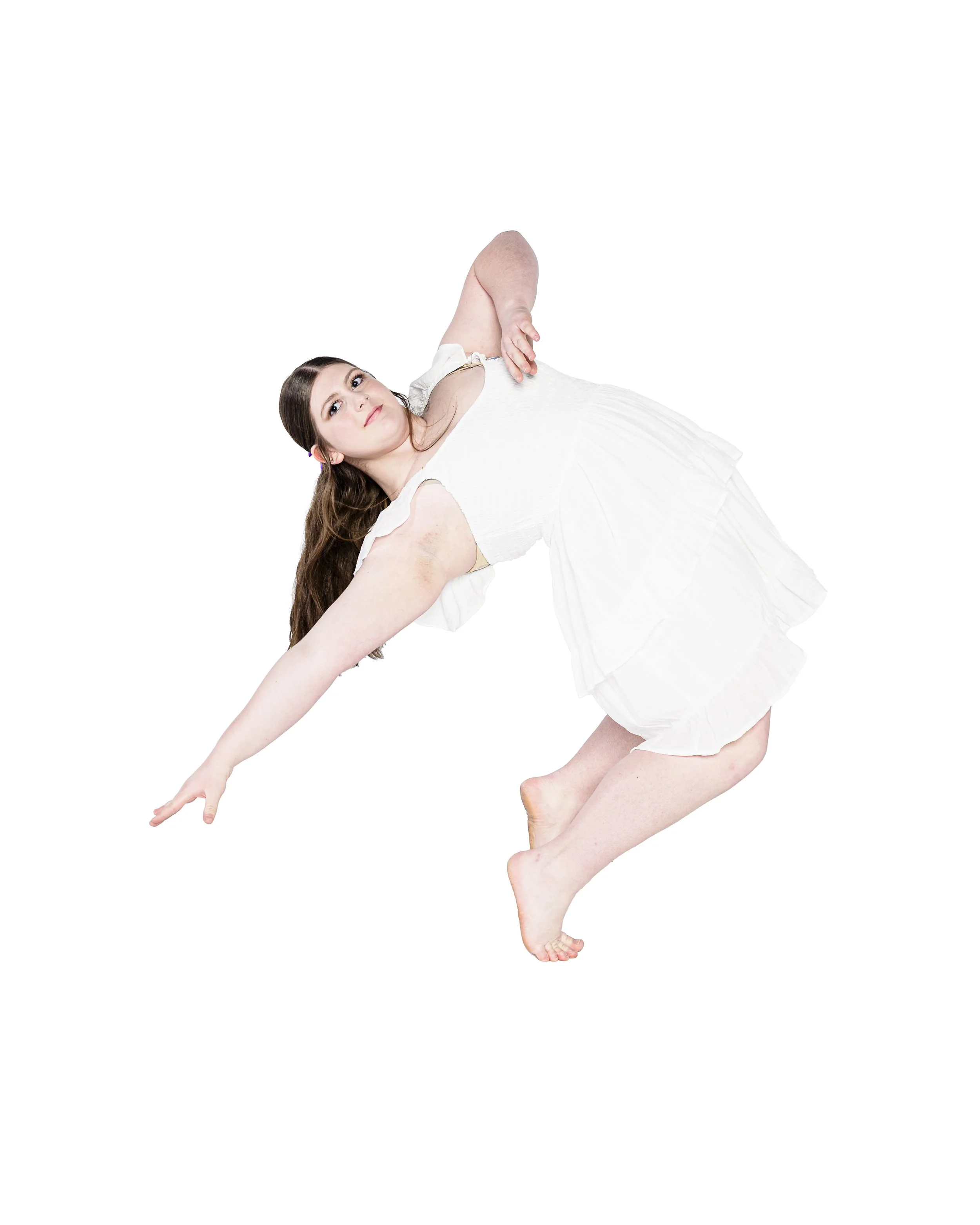 dancer in white dress reaching back