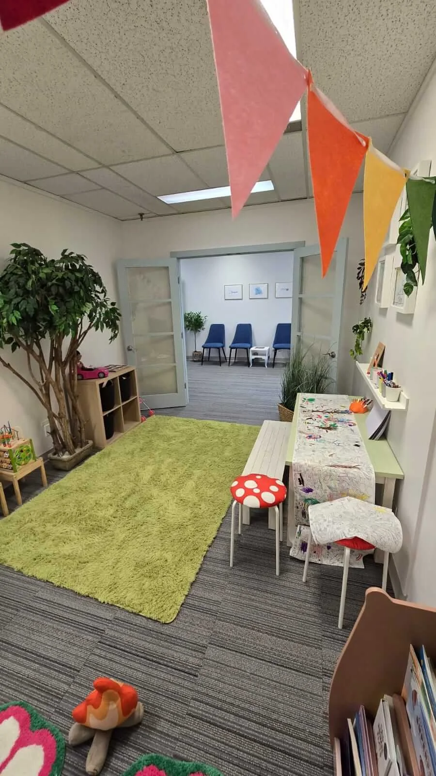 reverse view of playroom at Embark Psychology Calgary clinic