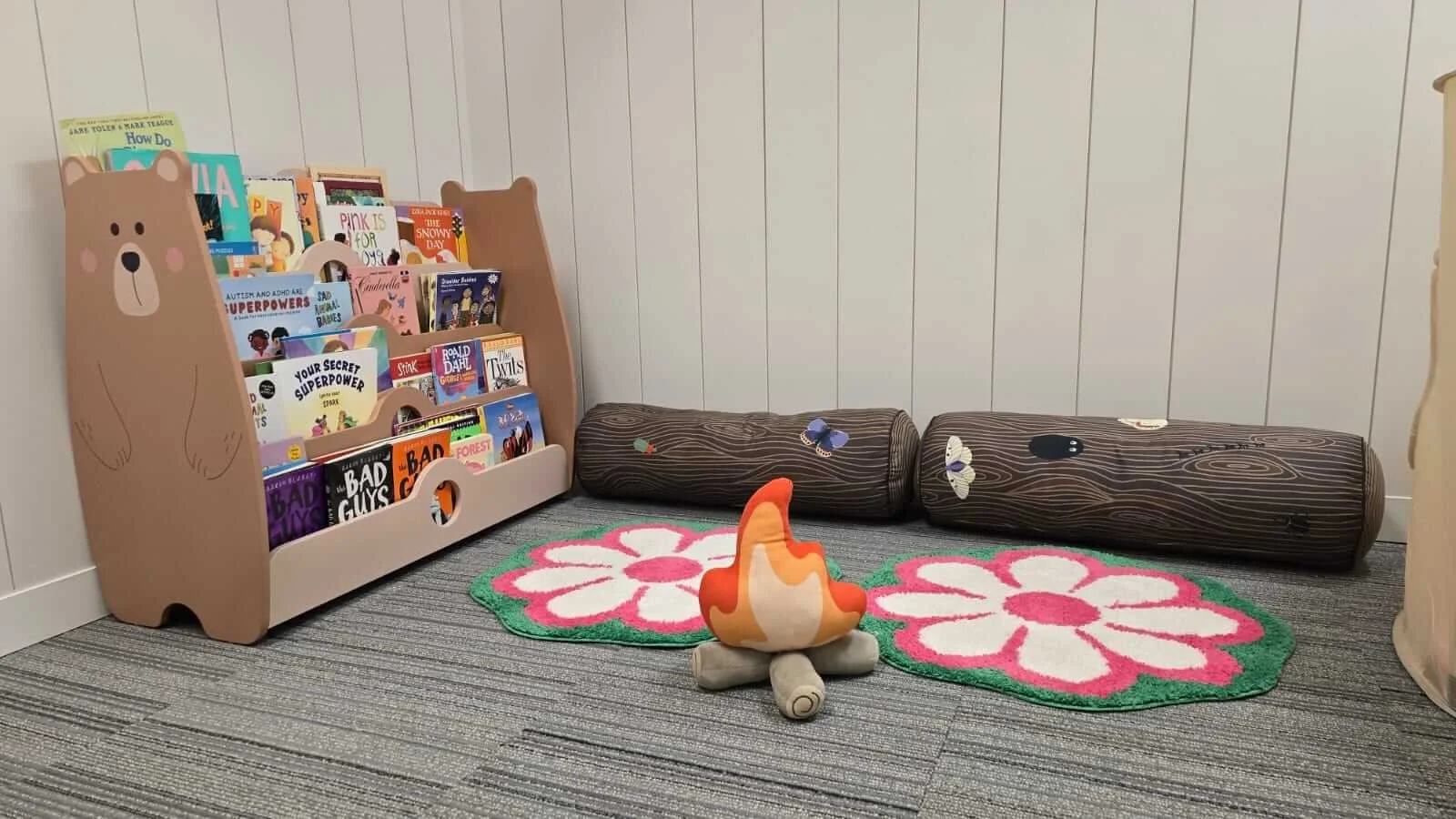 kids cozy reading nook in playroom at Embark Psychology Calgary