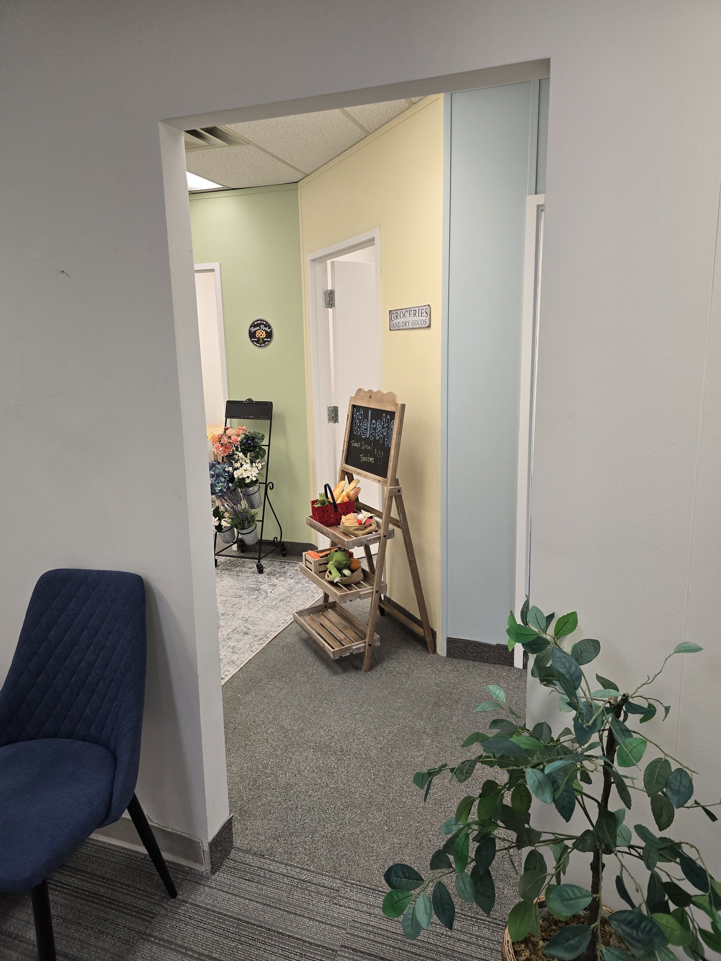 Entrance to the new office expansion in reception area at Embark Psychology Calgary clinic