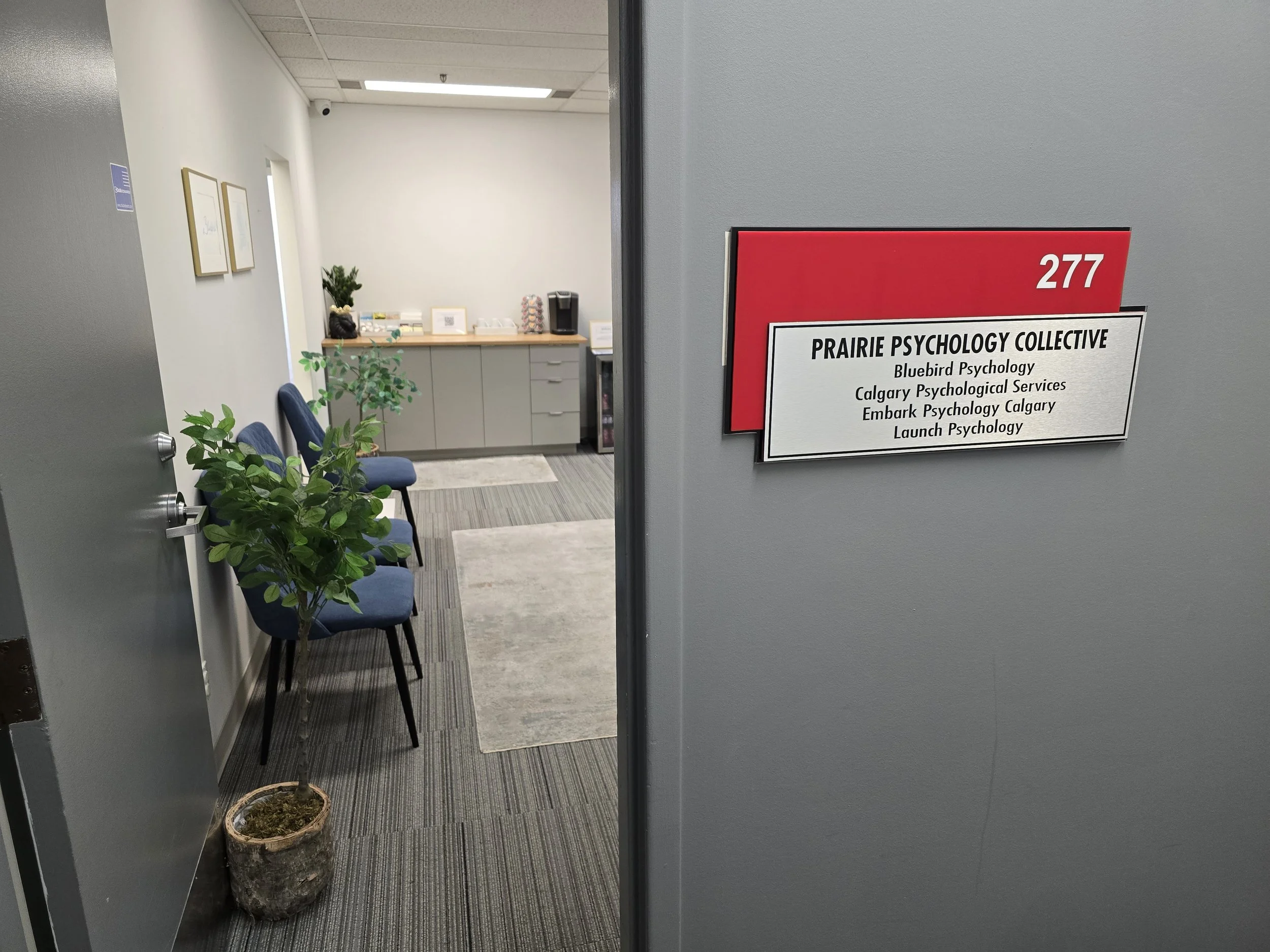 Office entrance at Embark Psychology Calgary clinic with a bright and welcoming atmosphere shared with Prairie Psychology Collective