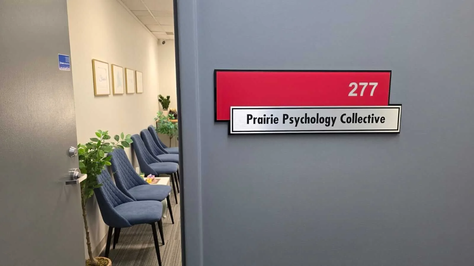 Office entrance for Embark Psychology Calgary clinic within a shared space called Prairie Psychology Collective