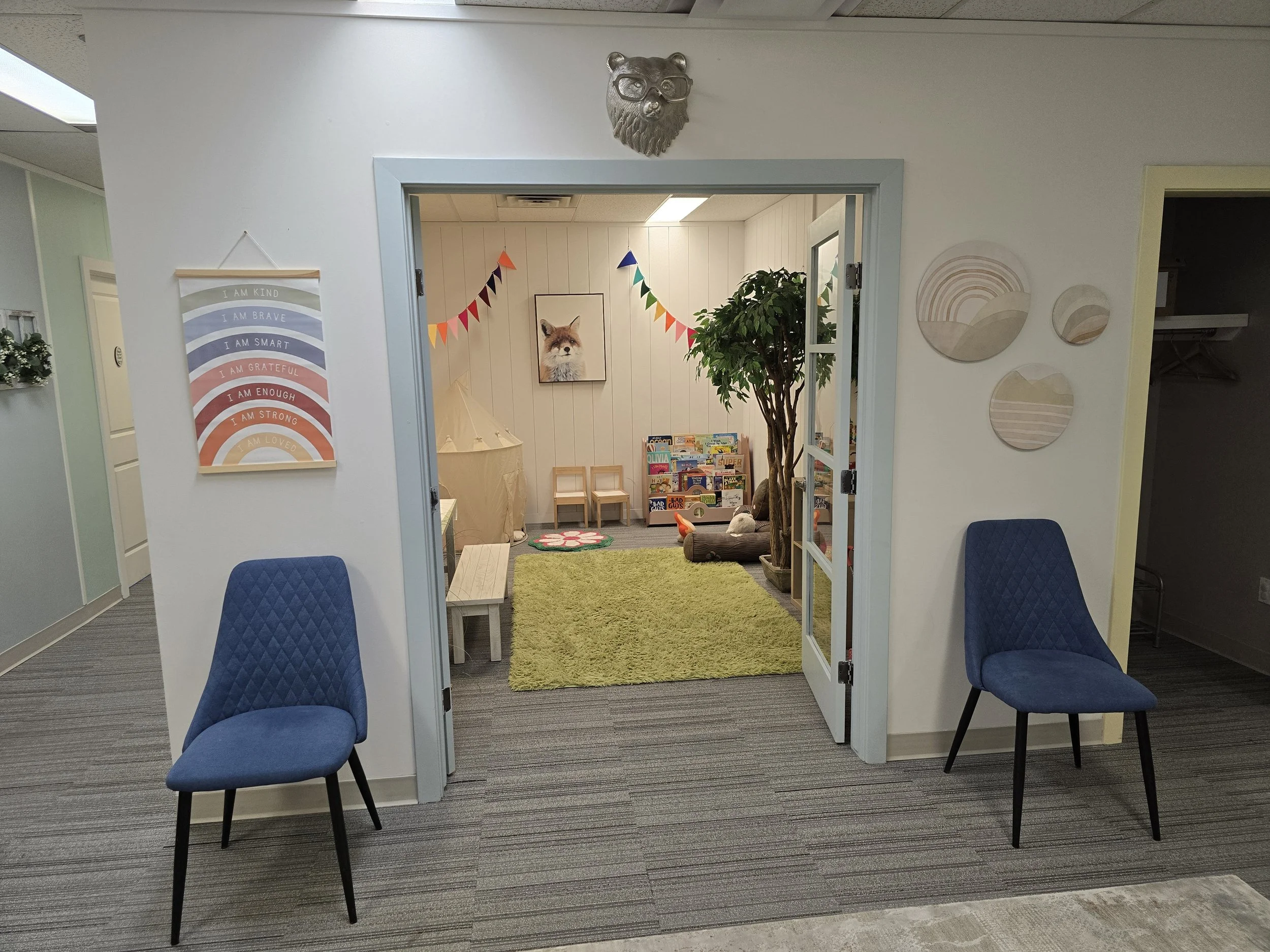 entrance of fun playroom for children at Embark Psychology Calgary clinic