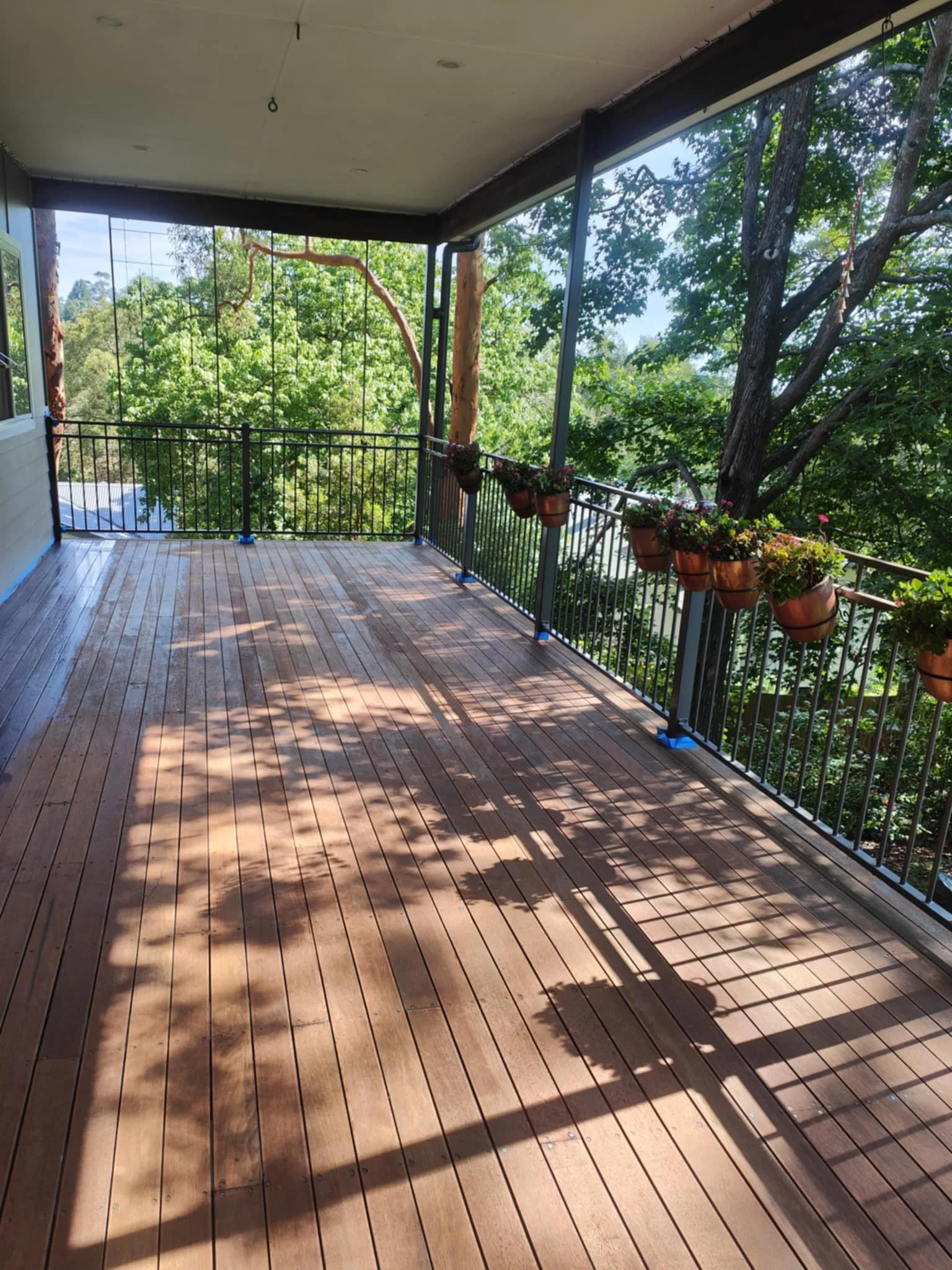 Timber decking balcony and balustrading. Decking builder, deck builder near me.  