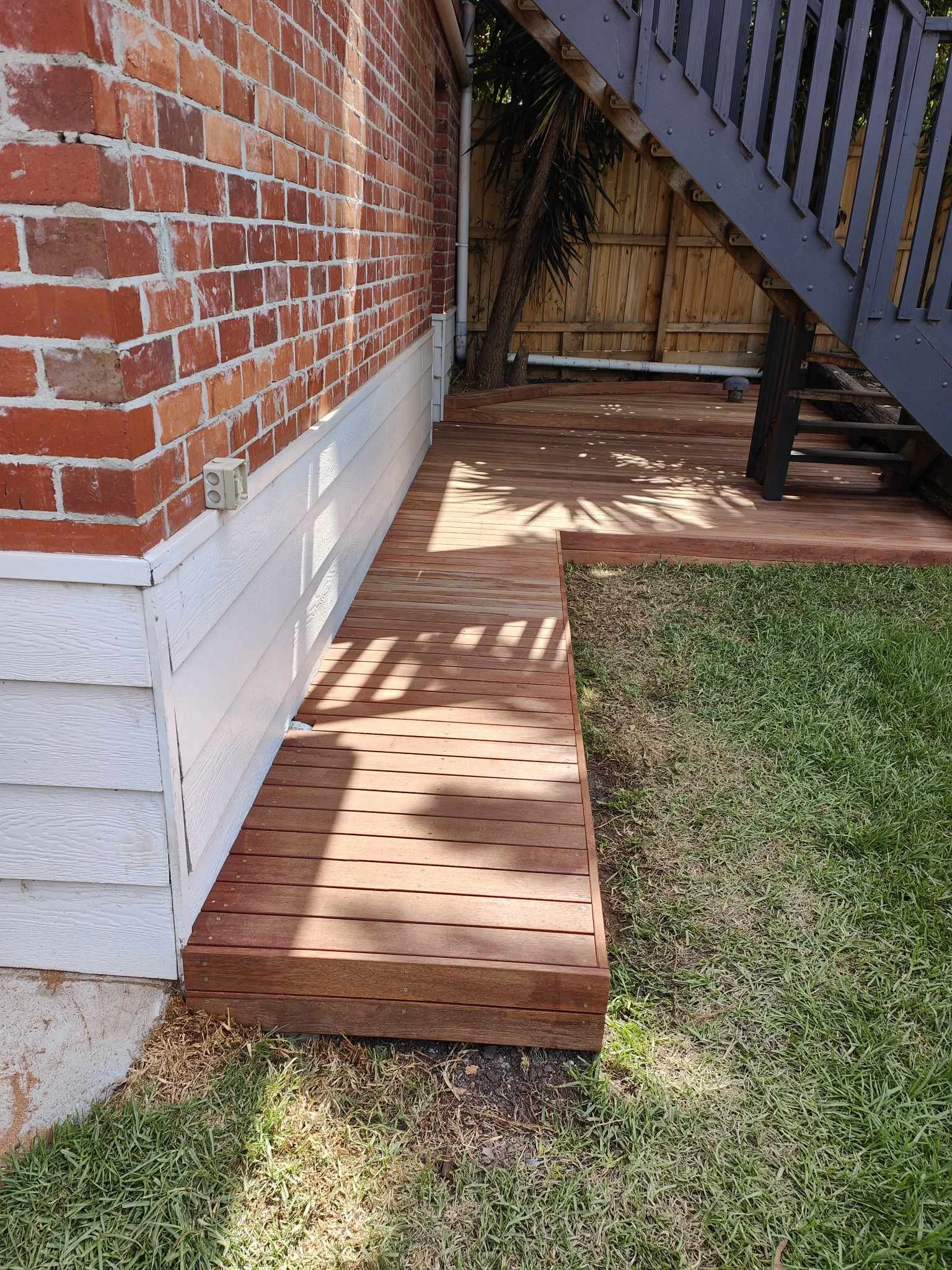 Merbau decking with step for outhouse. Blue Mountains deck solutions. 