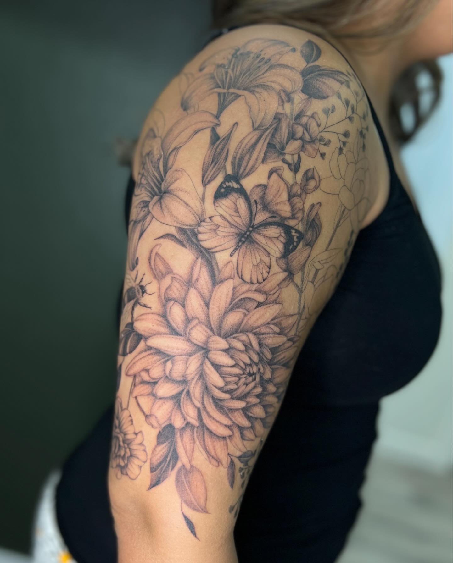 We&rsquo;re about half way done with this upper half sleeve made up of the birth flowers of my client and her family. I&rsquo;m seriously so excited to get back to this piece and see the finished product! 🖤

My love for large floral projects has rea