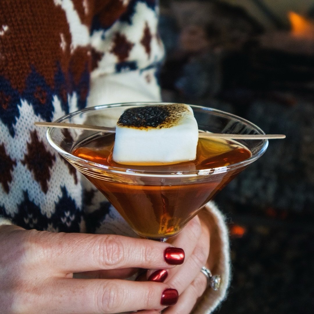 Cozy up with this stunning Campfire Manhattan at @lingeringshade. Stay warm with indoor seating, a fireplace and blankets and heaters on the patio! Cheers! 🍸🤩 

 + Available Wednesdays &amp; Thursdays for $15.

#QPR #qilafipublicrelations #publicre