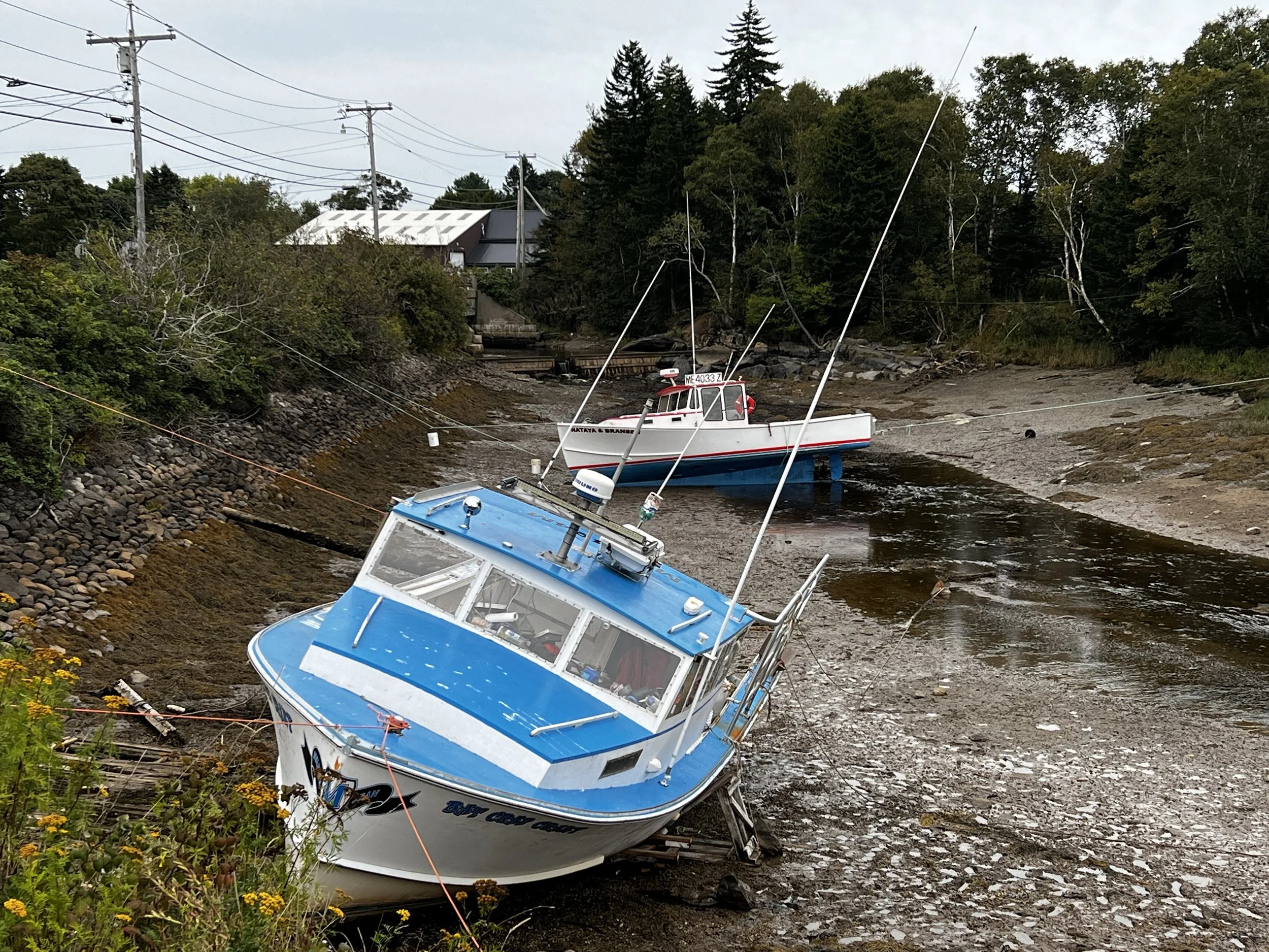 Two lobsterboats tide in Jonesport, Maine ahead of Hurricane Lee. September 2023