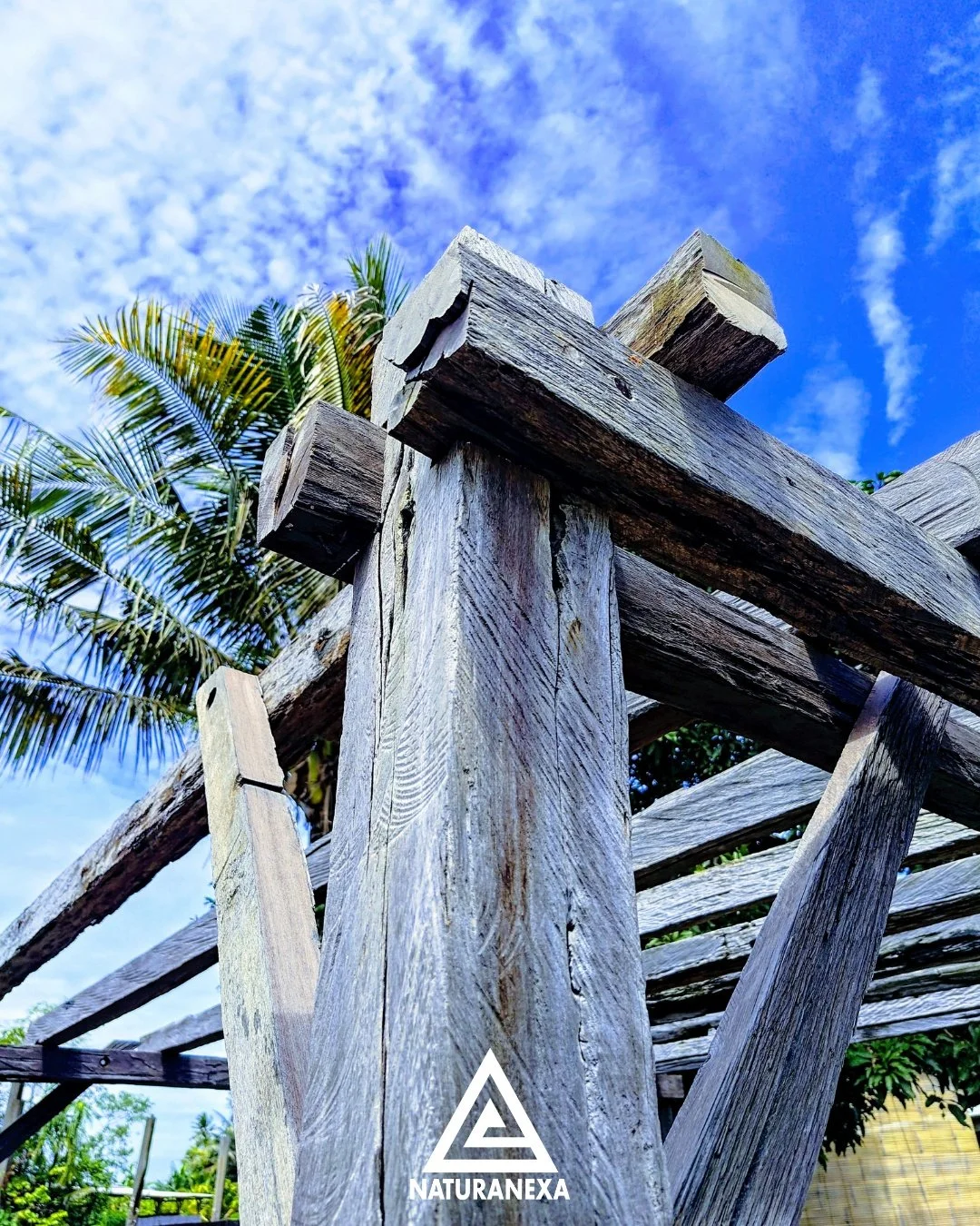 Not every project needs perfectly milled wood.

This pergola is built from reclaimed ironwood almost exactly as it was found &mdash; raw, powerful, and full of character. Minimal processing keeps the material authentic and also makes it a more afford