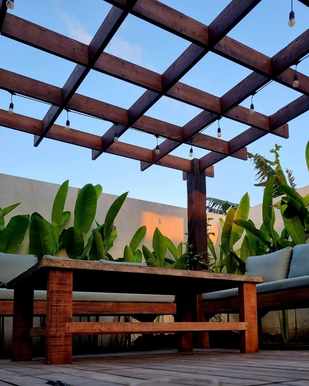 Sometimes it doesn&rsquo;t need to be more than this.

A quiet corner.
A view of the pool.
And time doing its thing&mdash;passion fruit slowly finding its way across reclaimed ironwood.

Spaces like this aren&rsquo;t designed to impress.
They&rsquo;r