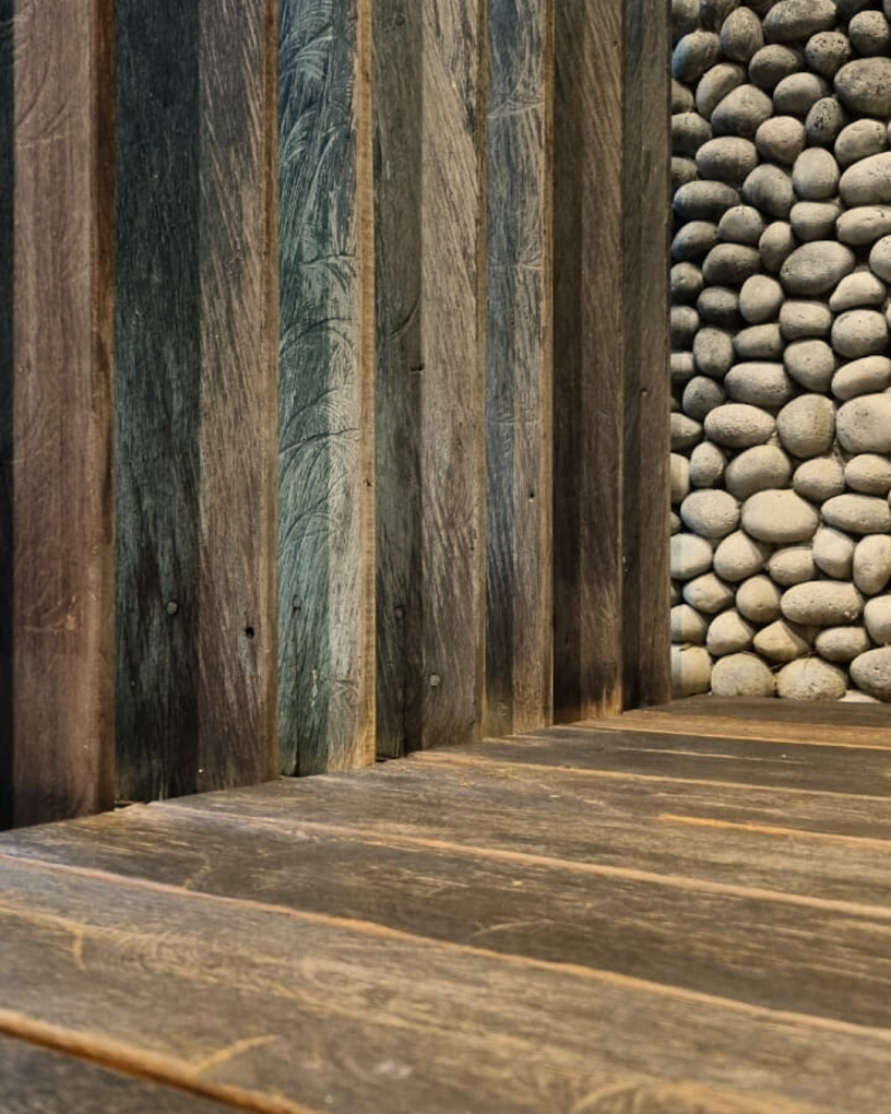 Close-up of reclaimed Ulin showing natural grain and reclaimed character