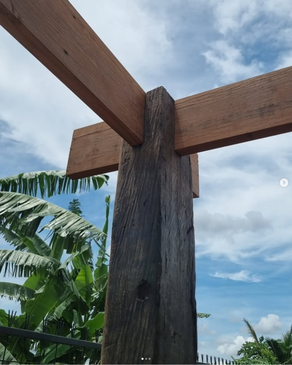 Reclaimed Ulin wooden pergola detail in Bali showing beams and rafters