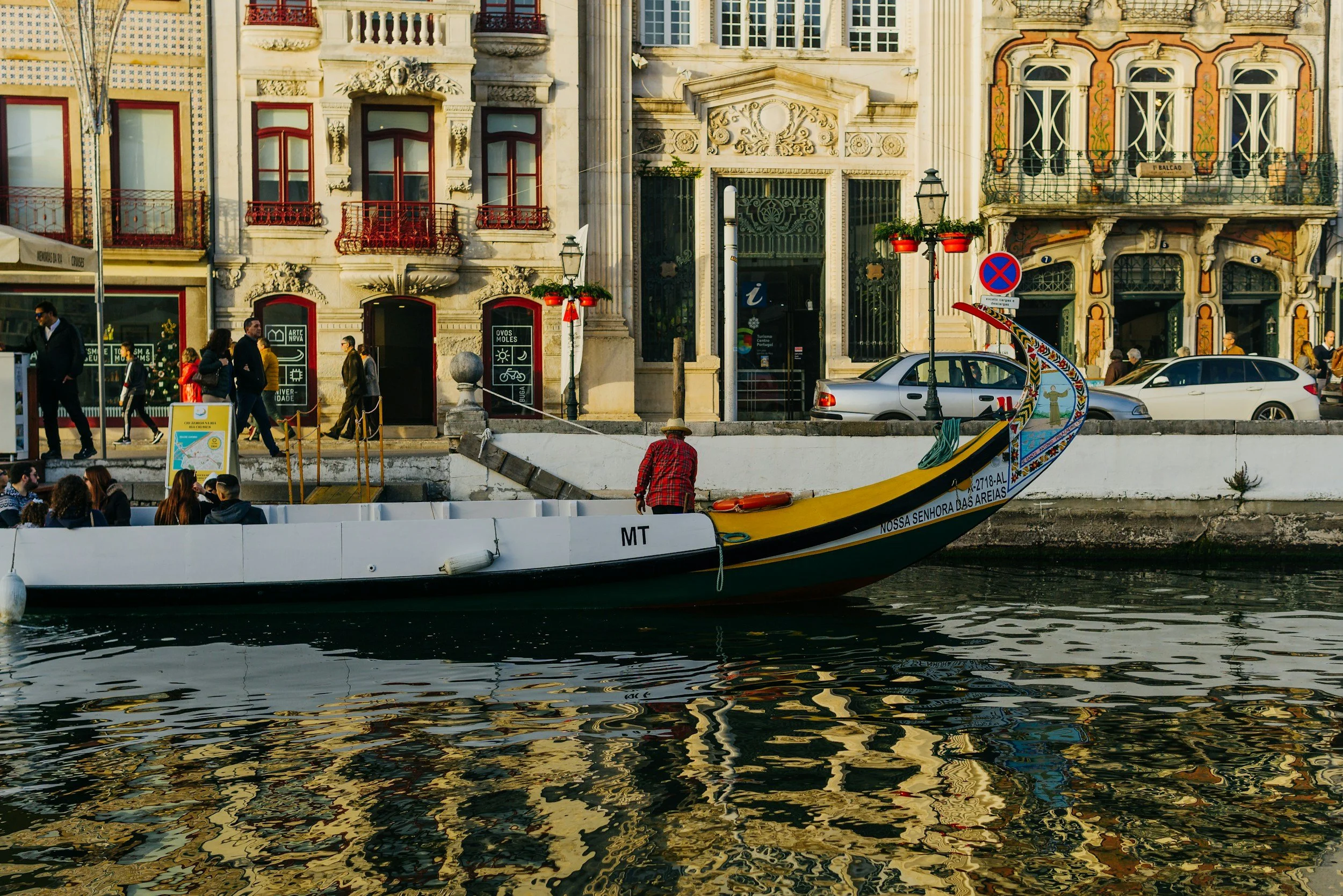 Aveiro: A coastal city famous for its colourful tiled buildings & canals.