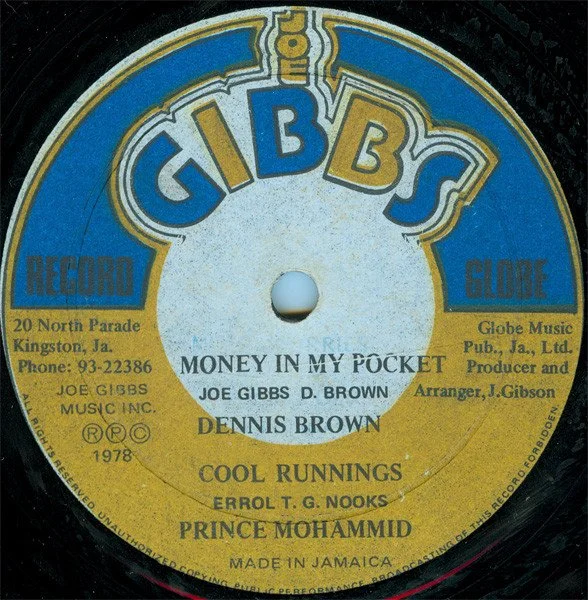 7 Inch single "Money In My Pocket" Dennis Brown.
