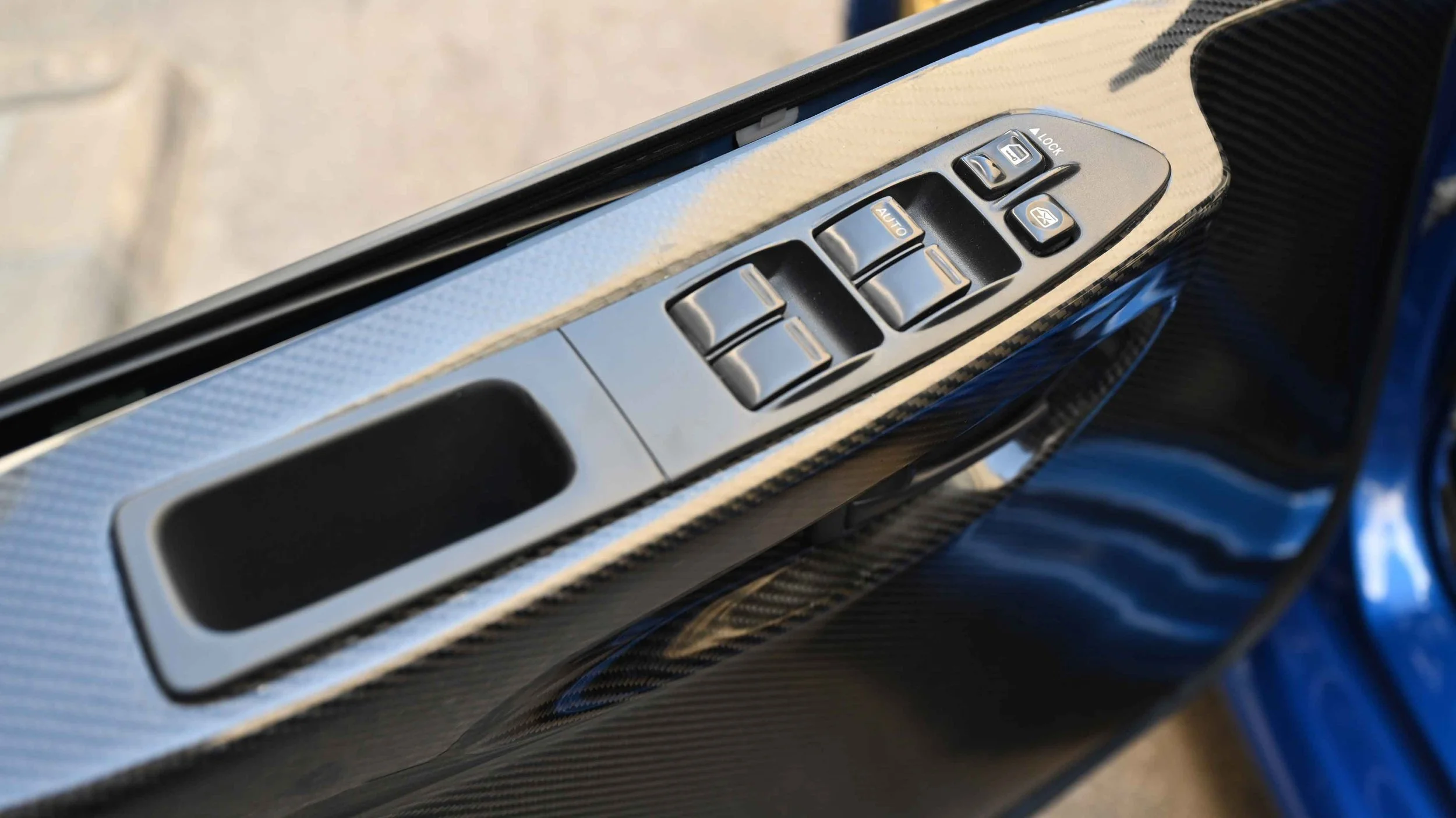 Subaru Impreza WRC S12 Reimagined window driver buttons