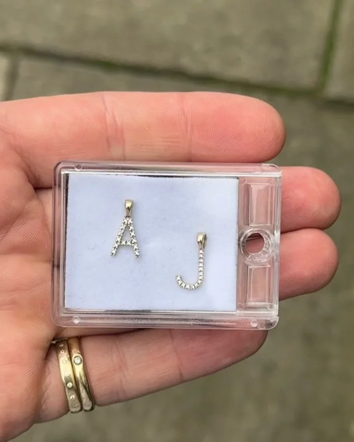 Diamond letter pendants, made to order.