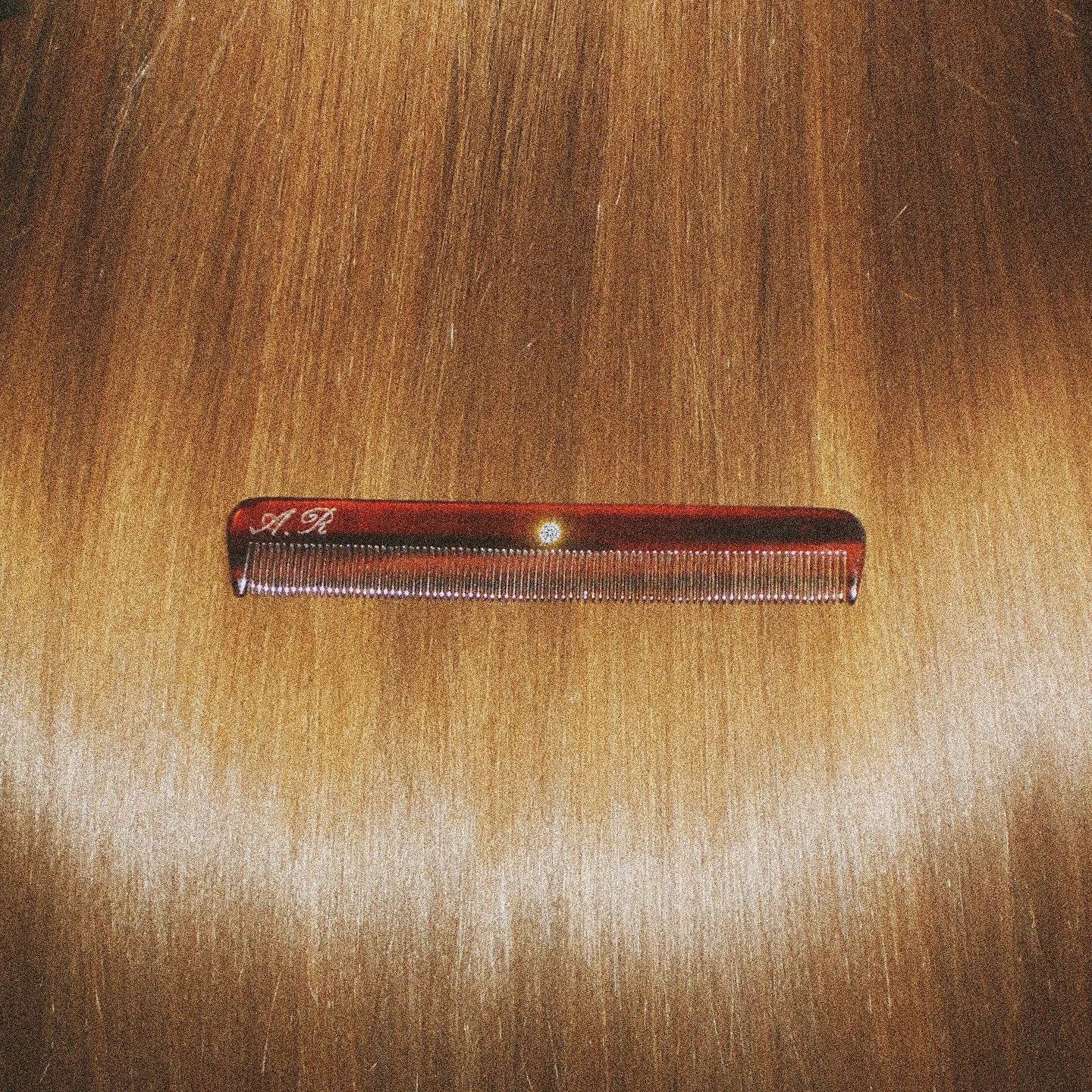 Impeccably parted. Diamond comb, now available with custom hand engraving.