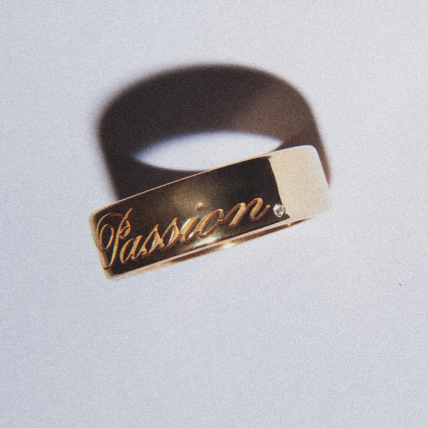 The script band. Completely customisable, set with a diamond full stop.

On site now.