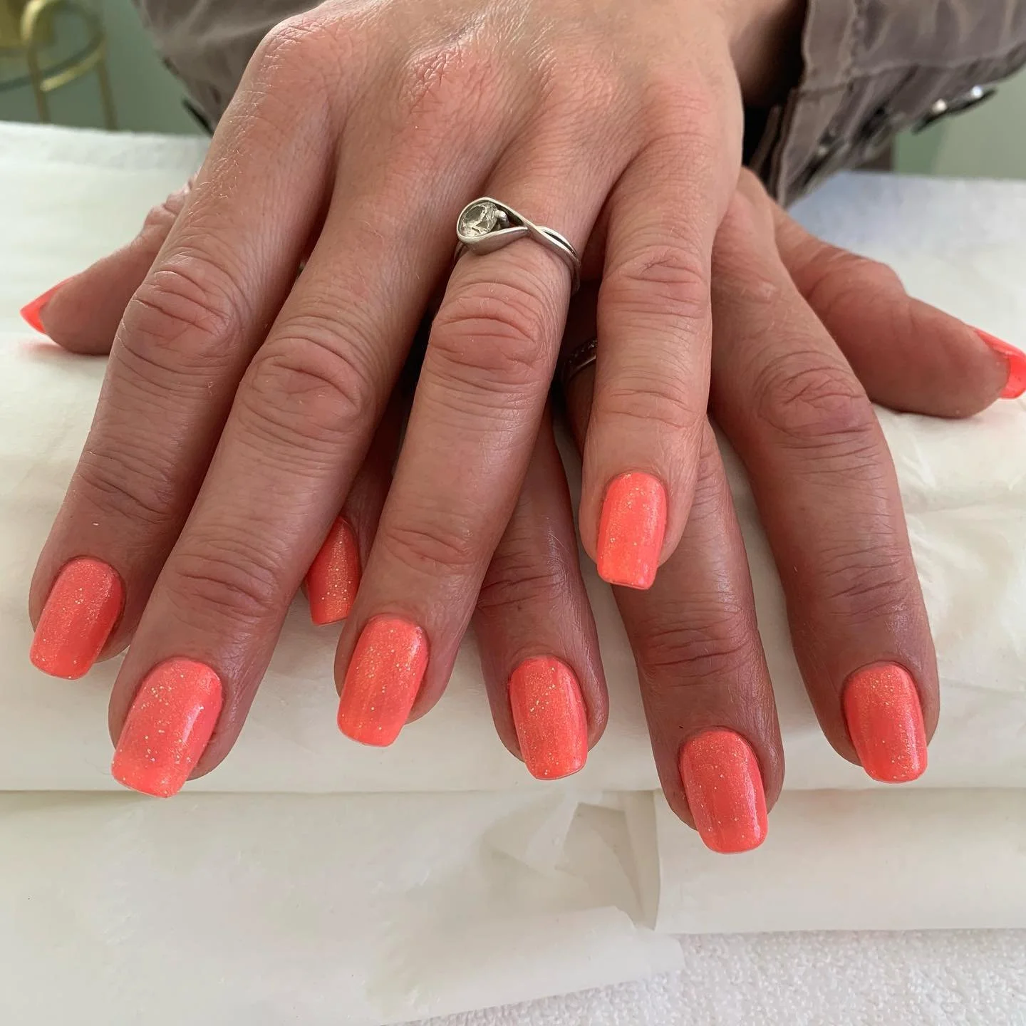 orange sparkle nails.jpg