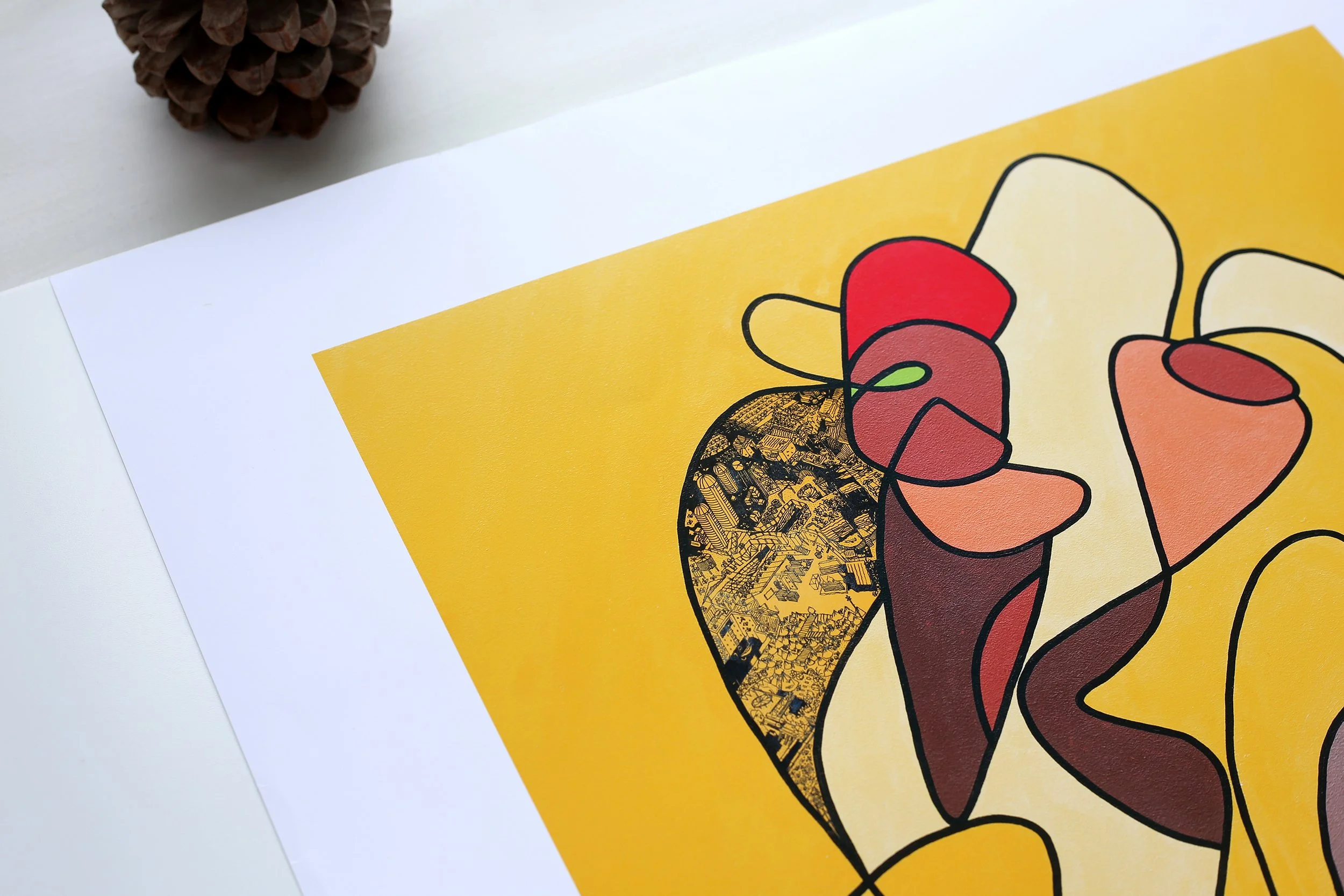 Cropped view of yellow artwork printed on premium paper