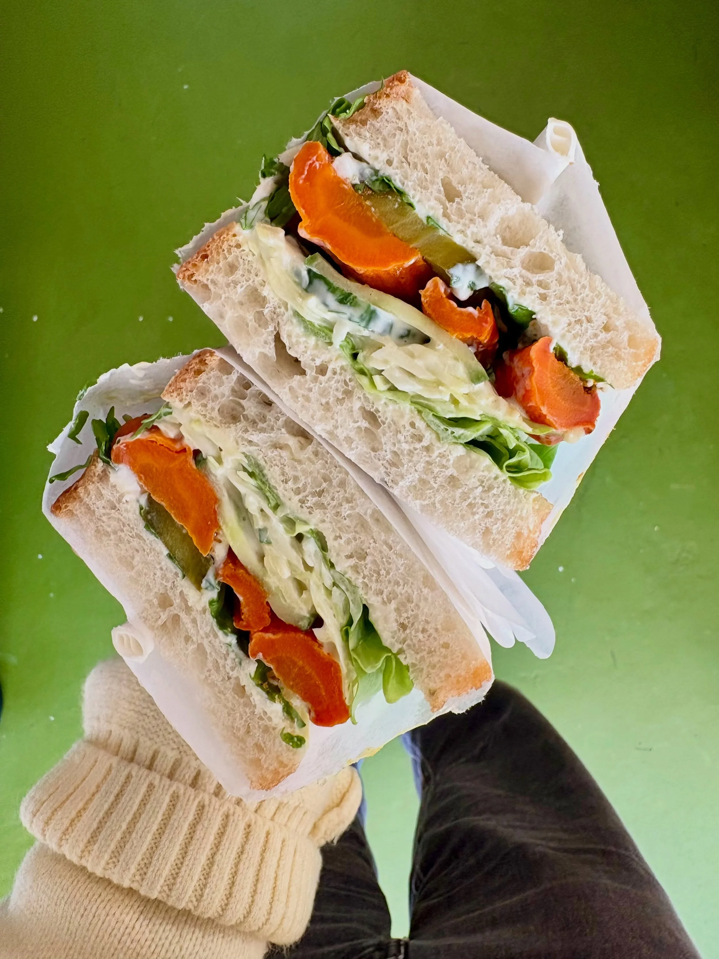 Roast carrot + ricotta + b &amp; b pickles + &lsquo;slaw + cucumber + butterhead lettuce

All between two slices of rosemary &amp; sea salt focaccia

On the counter today &amp; in the meal deal.

Here &lsquo;til 4 team 🐰
