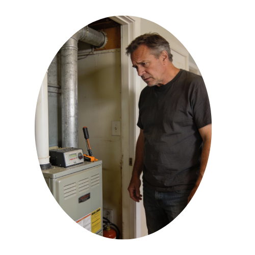 Homeowner in Owen Sound looking unsure about a home repair decision