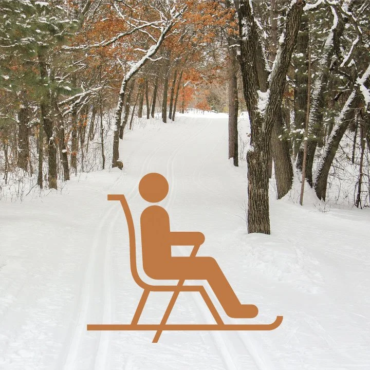  Additional Winter Adaptive Equipment 

 Universal snow ski attachments
that can be attached to any wheelchair or stroller to glide on snow. Cross-country skiing chair that allows participants to cross-country ski while sitting with ski poles to push