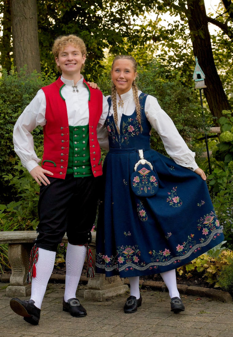 Mac and Lia 
 Lia's bunad represents the Lundeby District 