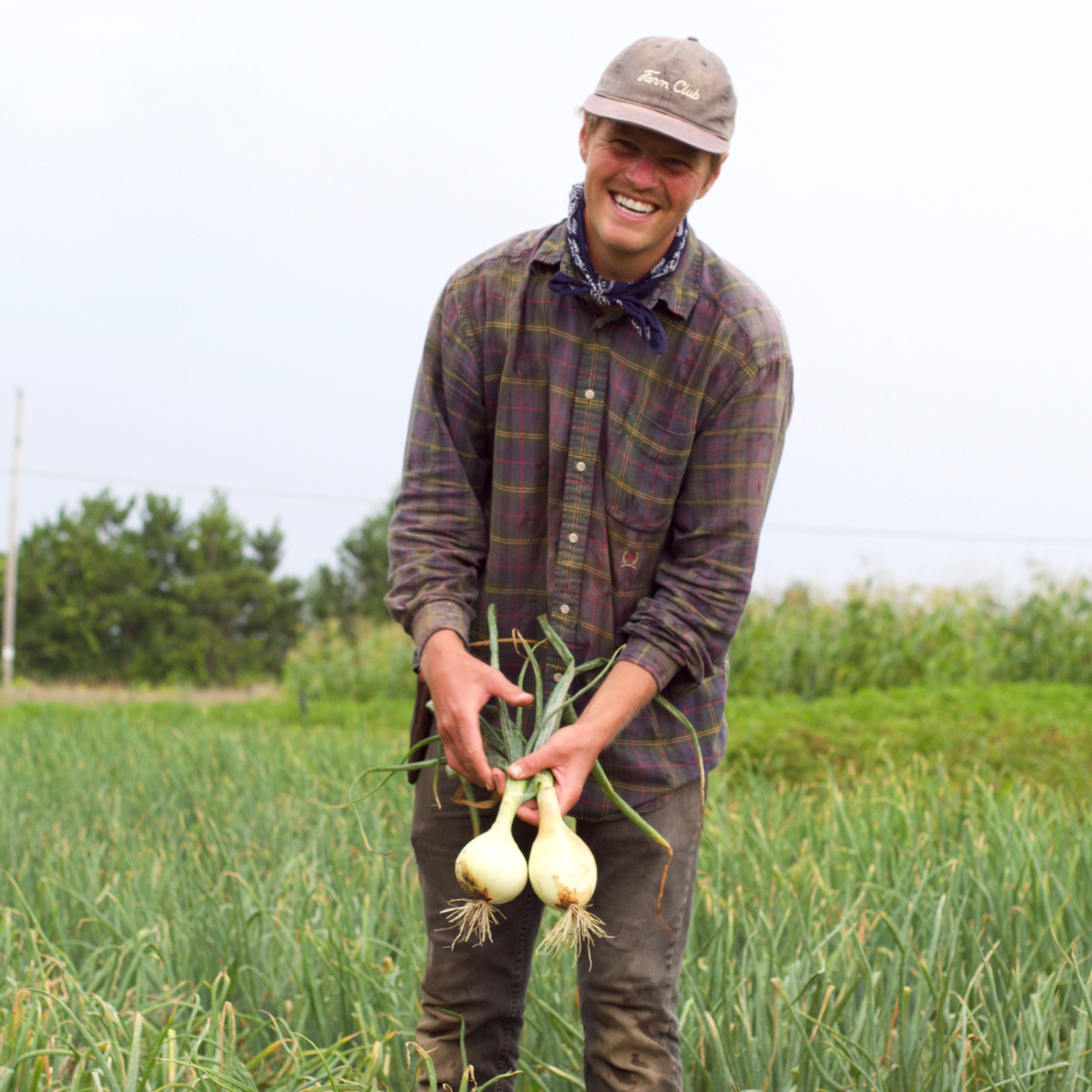 Tom with Ailsa Craig onions.JPEG