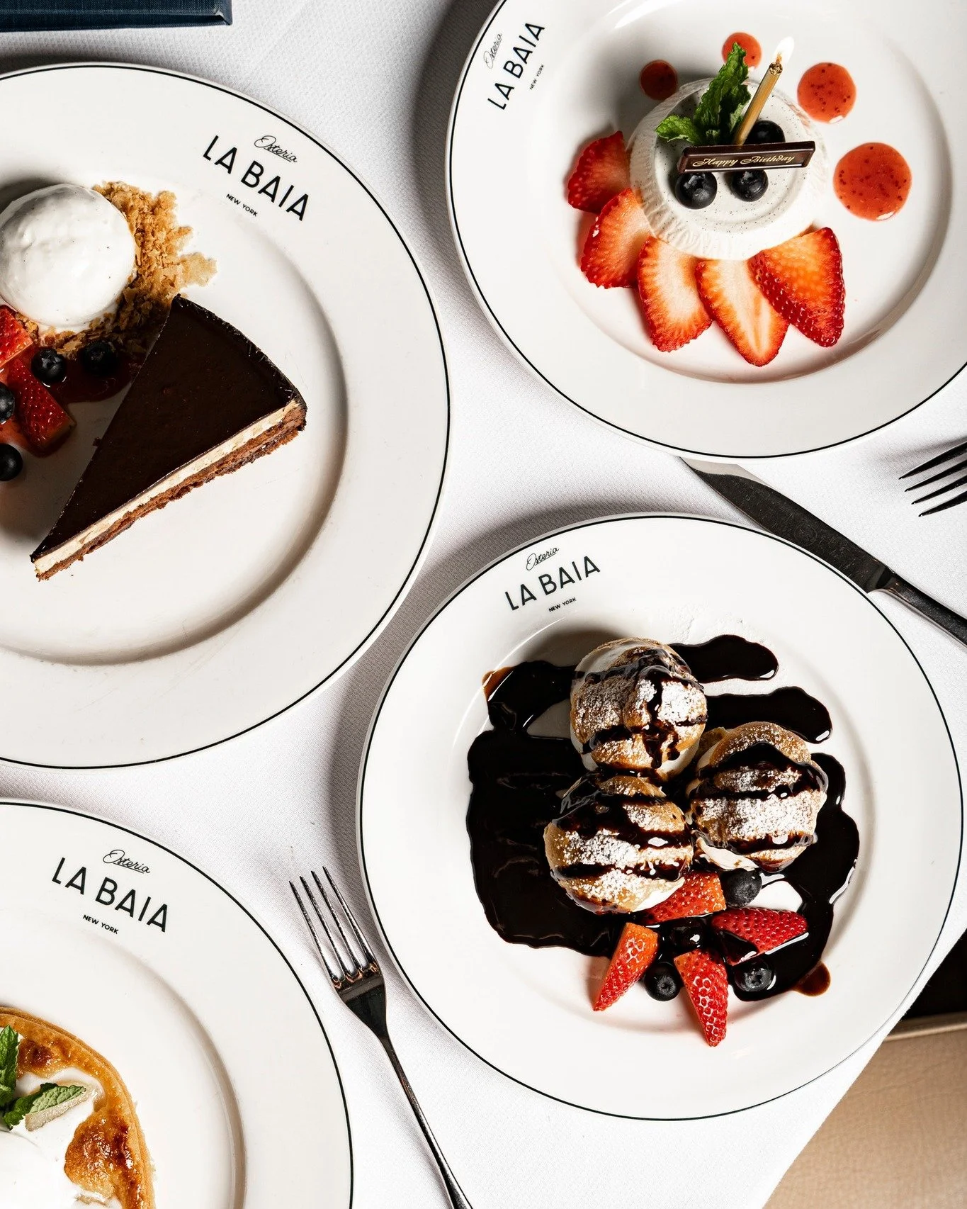 Three classics, each finished with precision. 
A dessert for every mood.

Profiteroles &ndash; stuffed with vanilla gelato, glazed with chocolate.

Chocolate Mousse &mdash; sliced chocolate &amp; caramel mousse, garnished with red fruit.

Panna Cotta