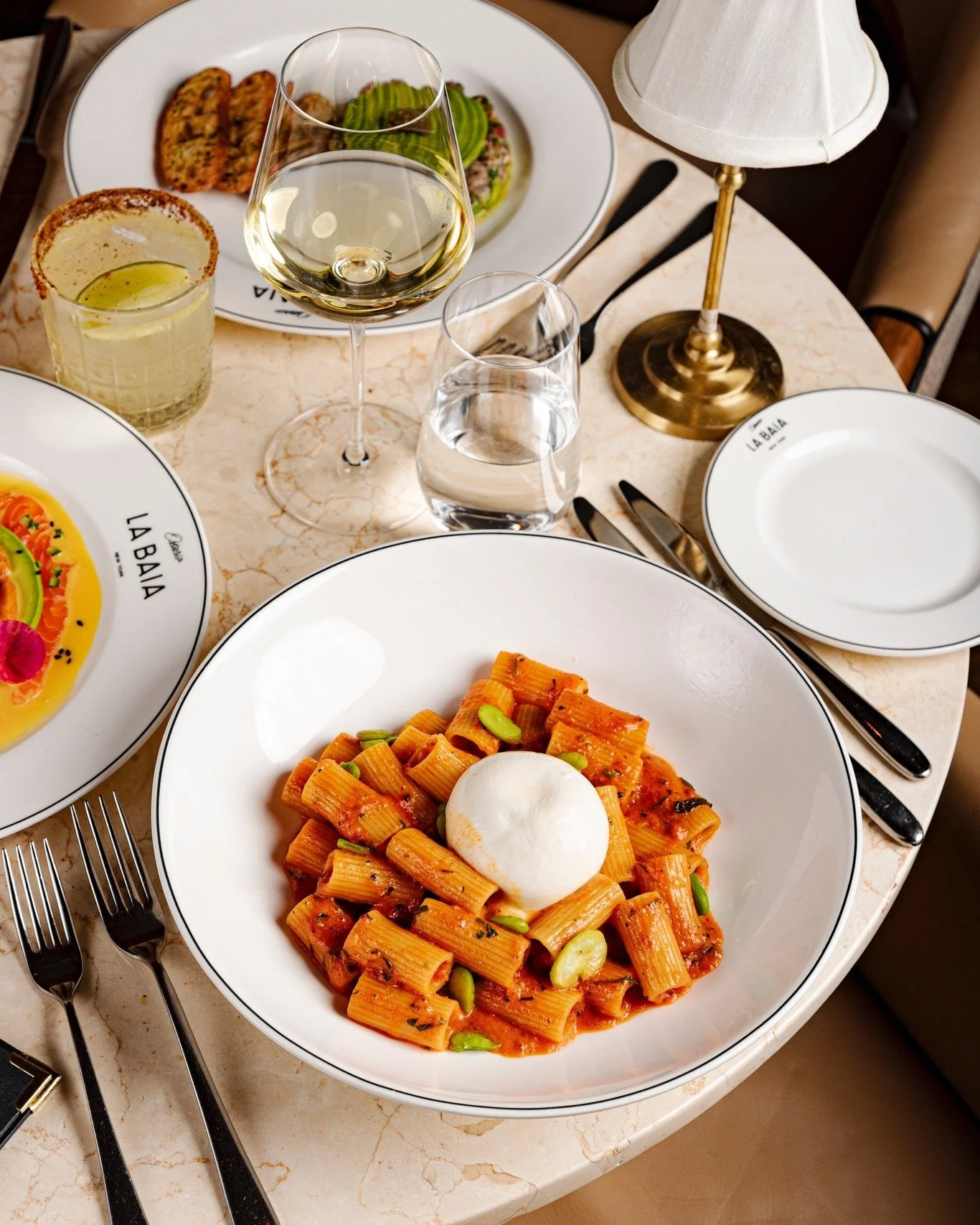 Pasta alla Vodka &mdash; signature rigatoni, stracciatella cheese, basil leaves, pickled fresno peppers. 
Creamy, bright, and finished with a gentle kick.