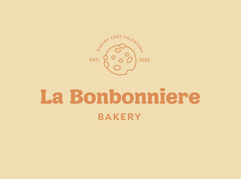 Logo for La Bonbonniere Bakery featuring a cookie illustration and text.