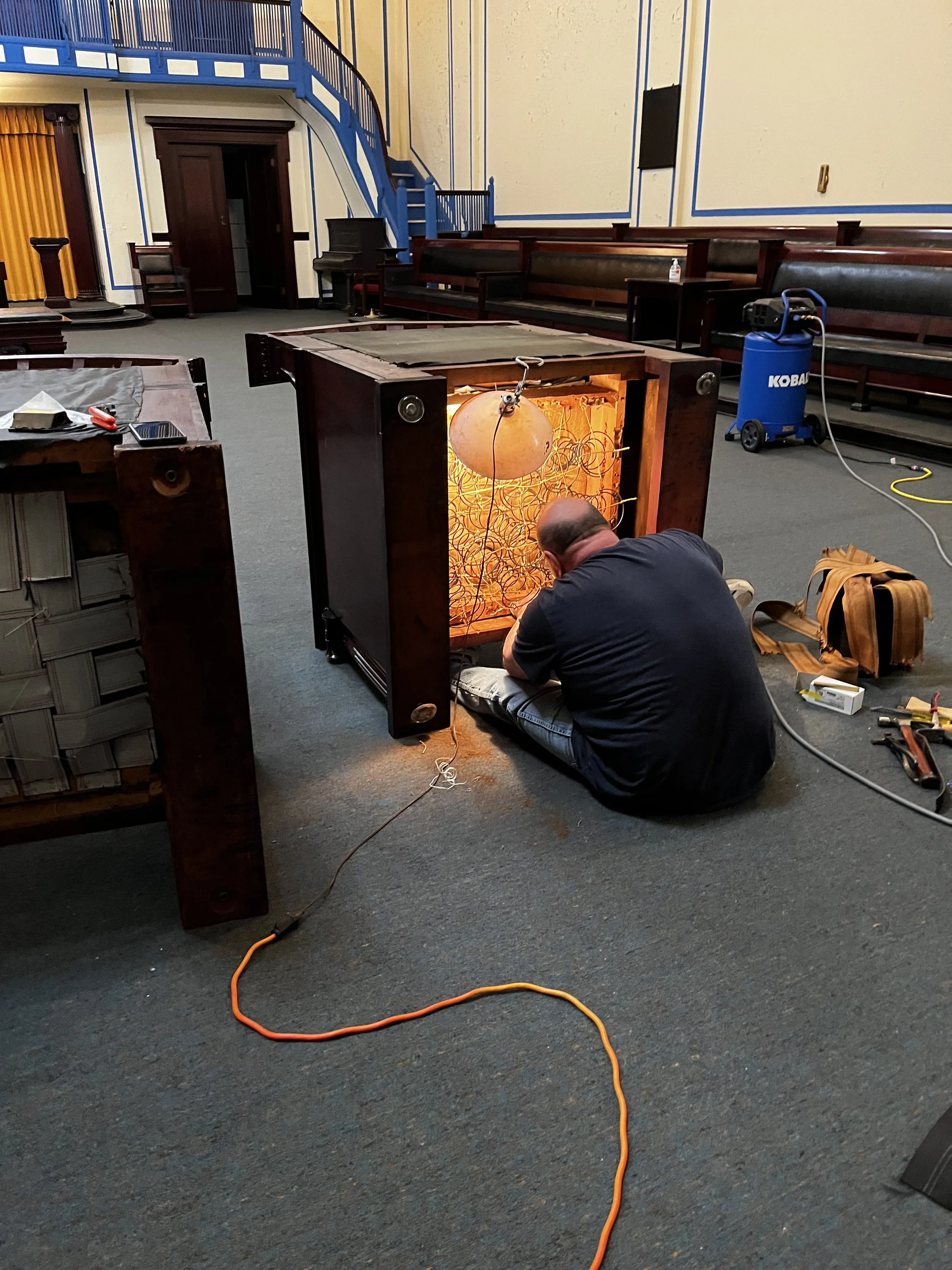 Removing old seats Indianapolis Masonic Lodge